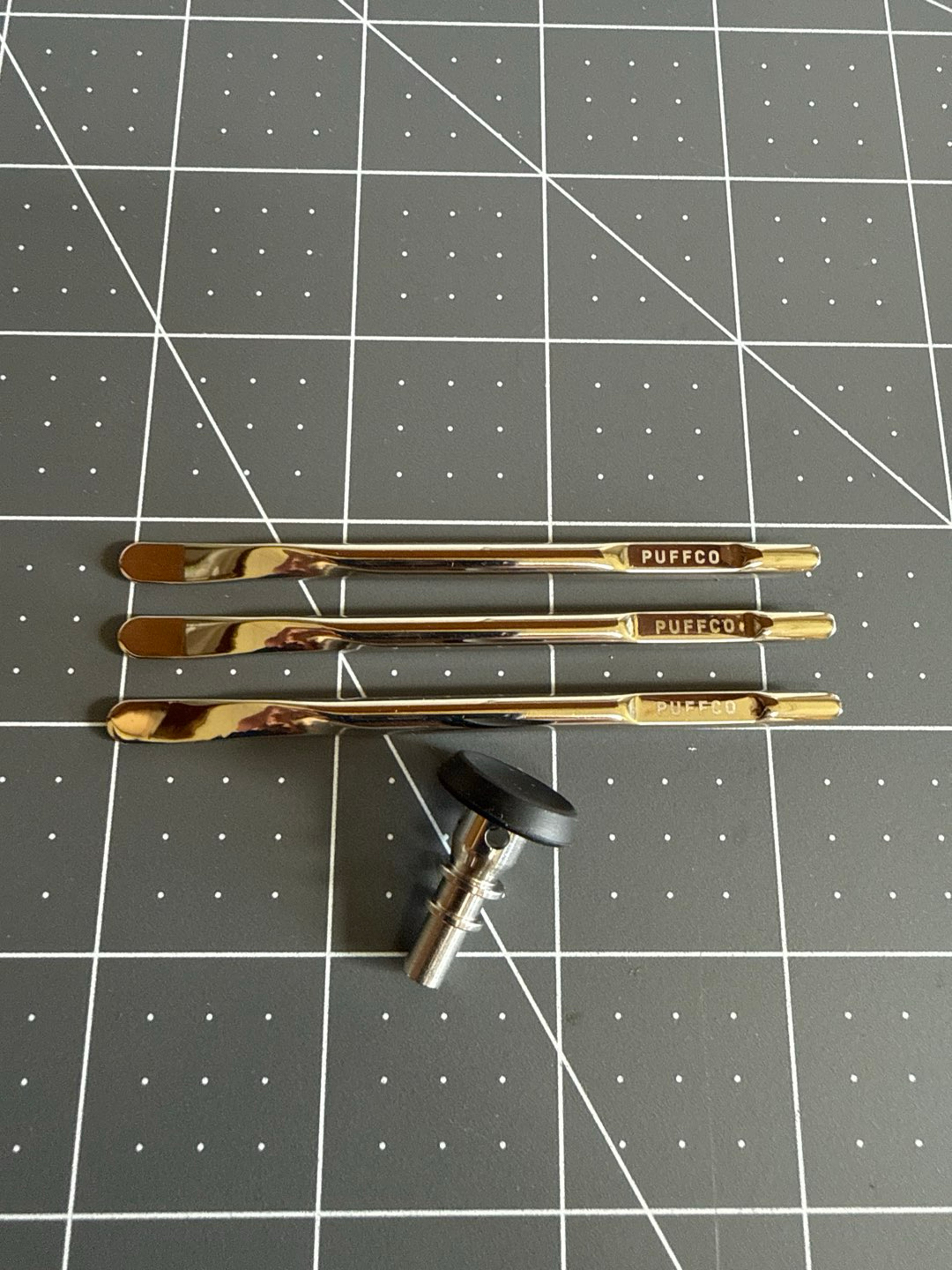 Preview pic of Three Puffco dab tools and one stock 3dXL joystick with black silicone