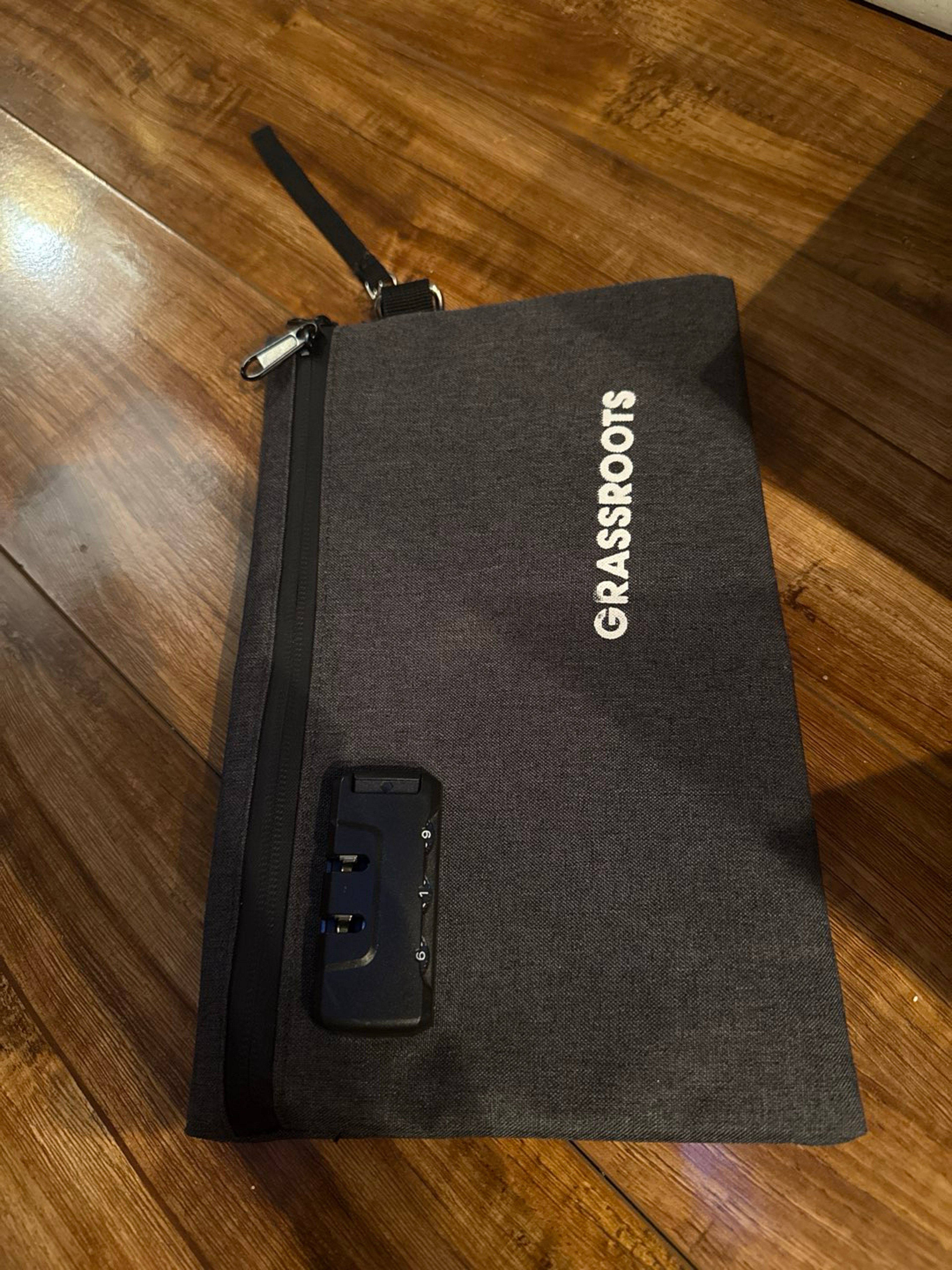 Preview pic of Grassroots branded lockable bag with combination new