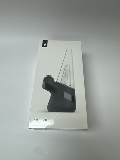 Preview pic of New Puffco Peak, Black, Sealed in Plastic , Brand new !