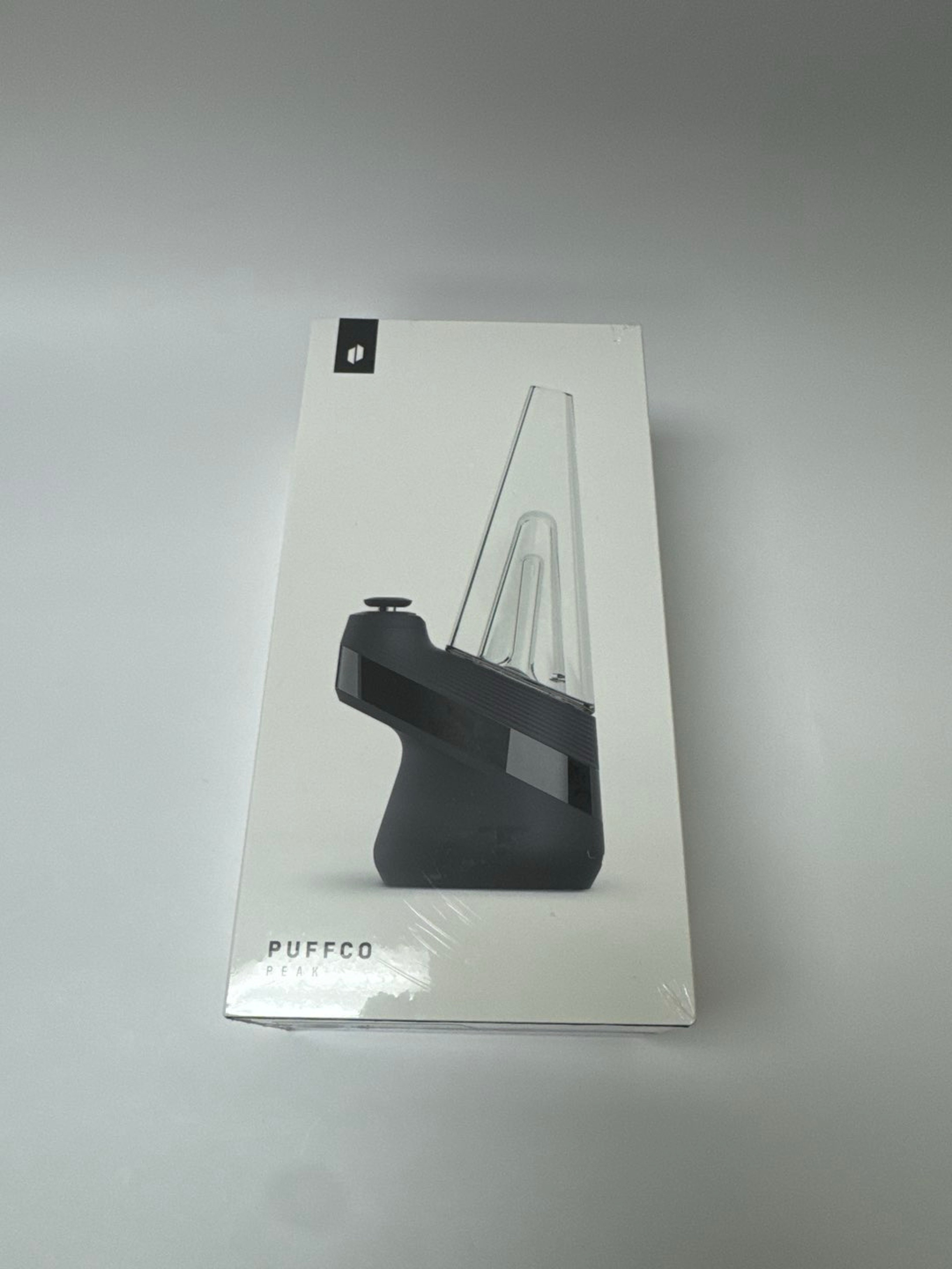 Preview pic of New Puffco Peak, Black, Sealed in Plastic , Brand new !