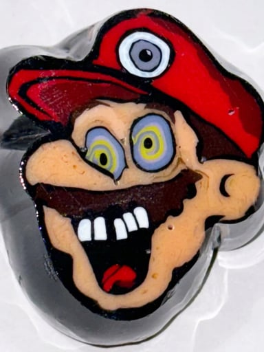 Preview pic of Psychedelic Mario Paperweight