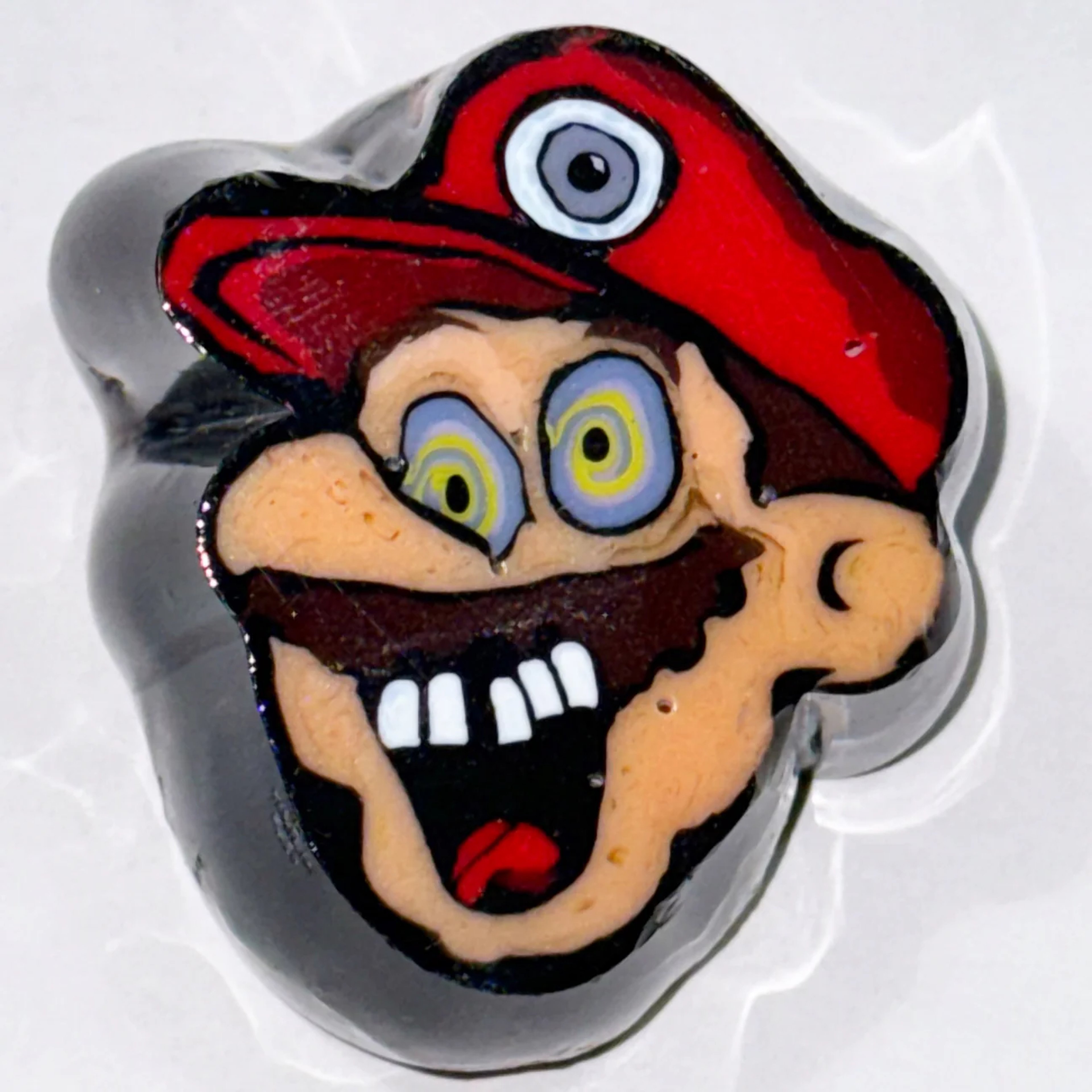 Preview pic of Psychedelic Mario Paperweight