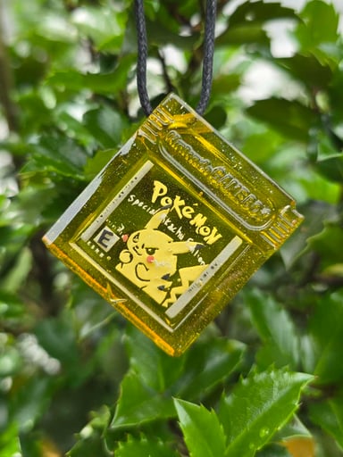 Preview pic of Seconds Pokemon Yellow Game Cartridge Glow Pendant