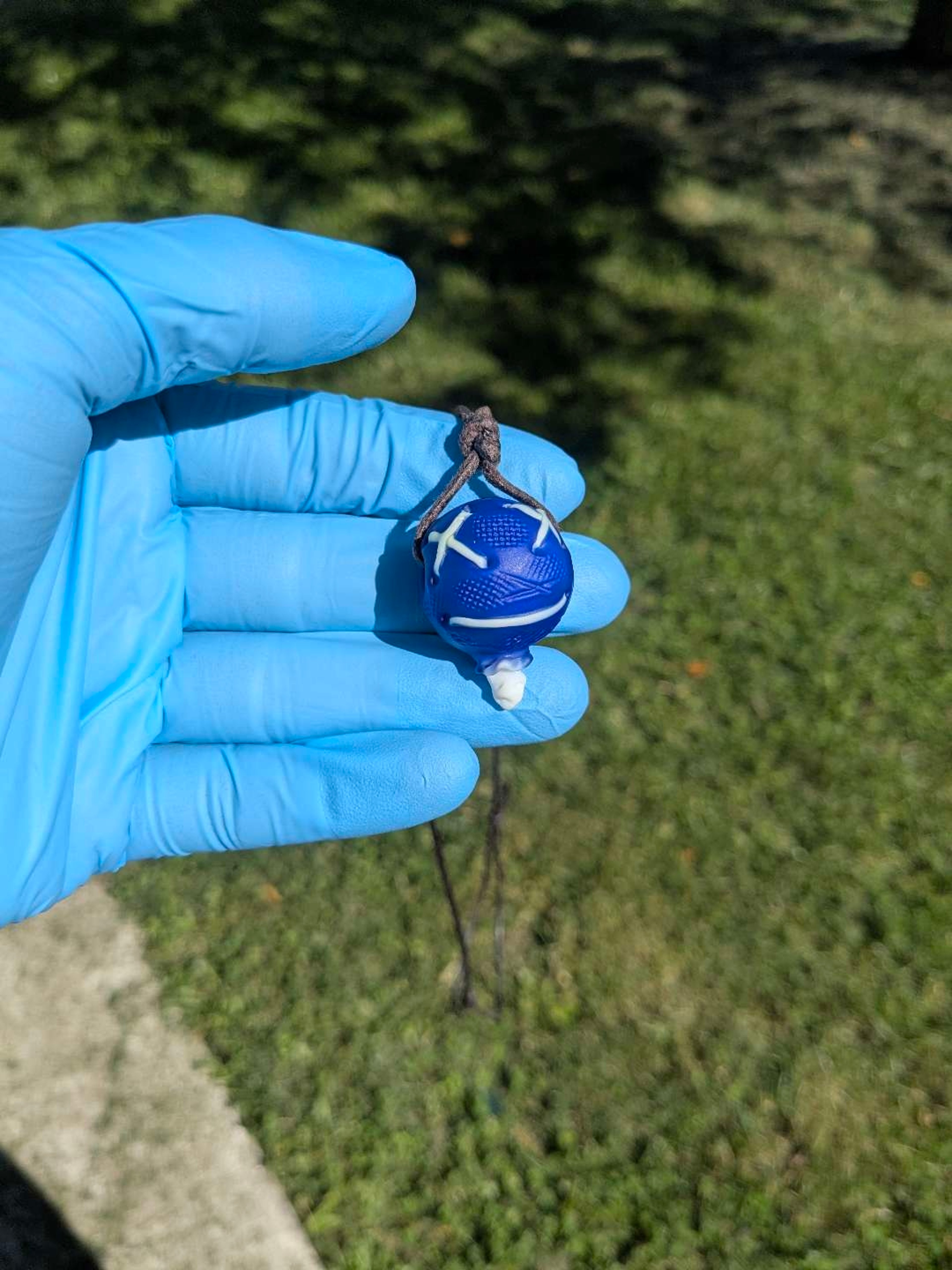 Preview pic of Peter Muller Voodoo Doll Severed Head Pendant