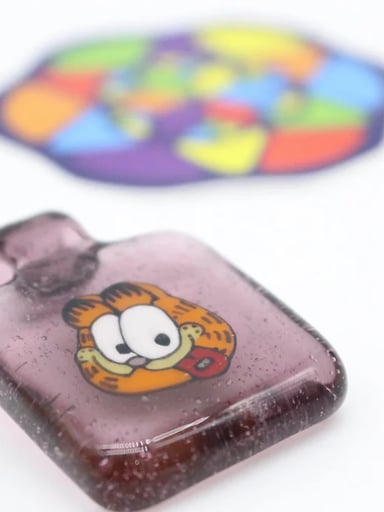Preview pic of * no reserve ITSKINDOFAKUSHYSTORY "GARFIELD" FLIP PENDANT