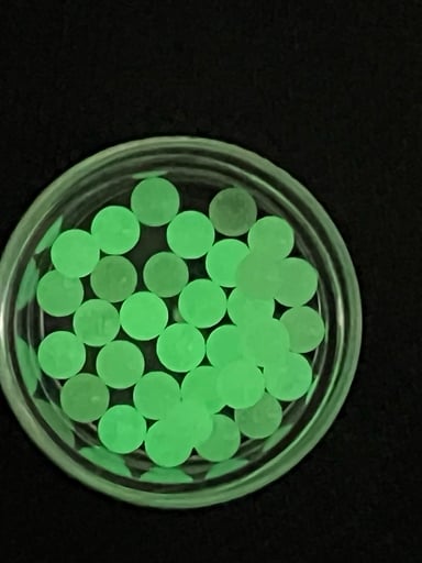 Preview pic of (X2) 4mm Green glow in the dark terp pearls for puffco peak, peak pro, proxy, dr. Dabber switch, carta