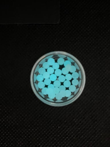 Preview pic of (2)4mm light blue glow in the dark terp pearls for puffco peak, peak pro, proxy, dr. Dabber switch all e rig setups
