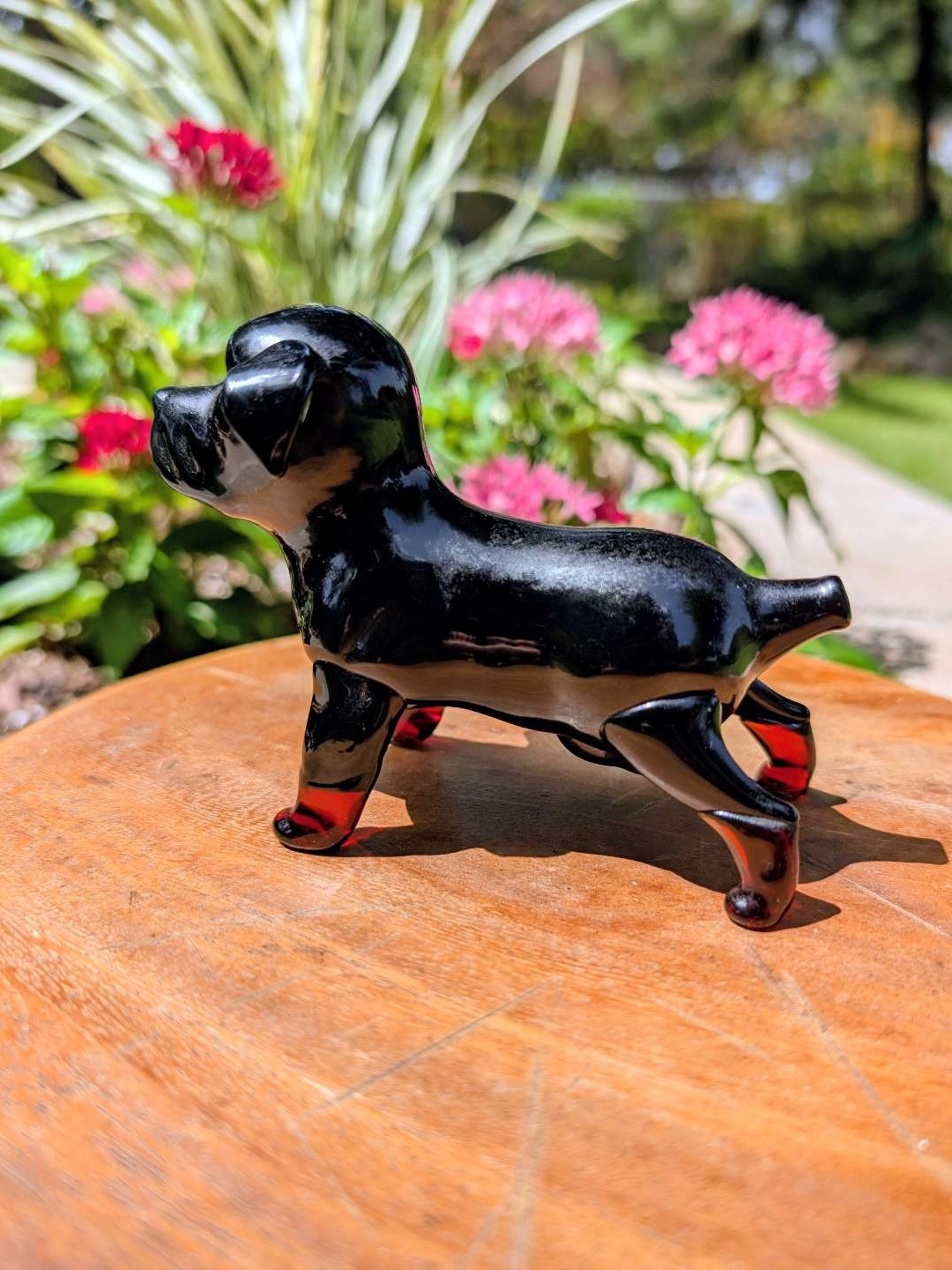 Preview pic of Vintage Glass Dog Pipe – High-Gloss Black with Amber Toe Accents