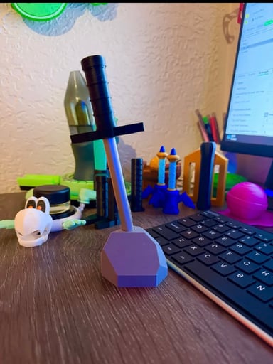 Preview pic of sword and stone puffco hot knife stand .