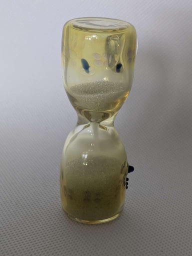 Preview pic of Snodgrass Family (3rd Gen) — Fumed Glass Hourglass Pendant w/ Working Sand & Silver Fume