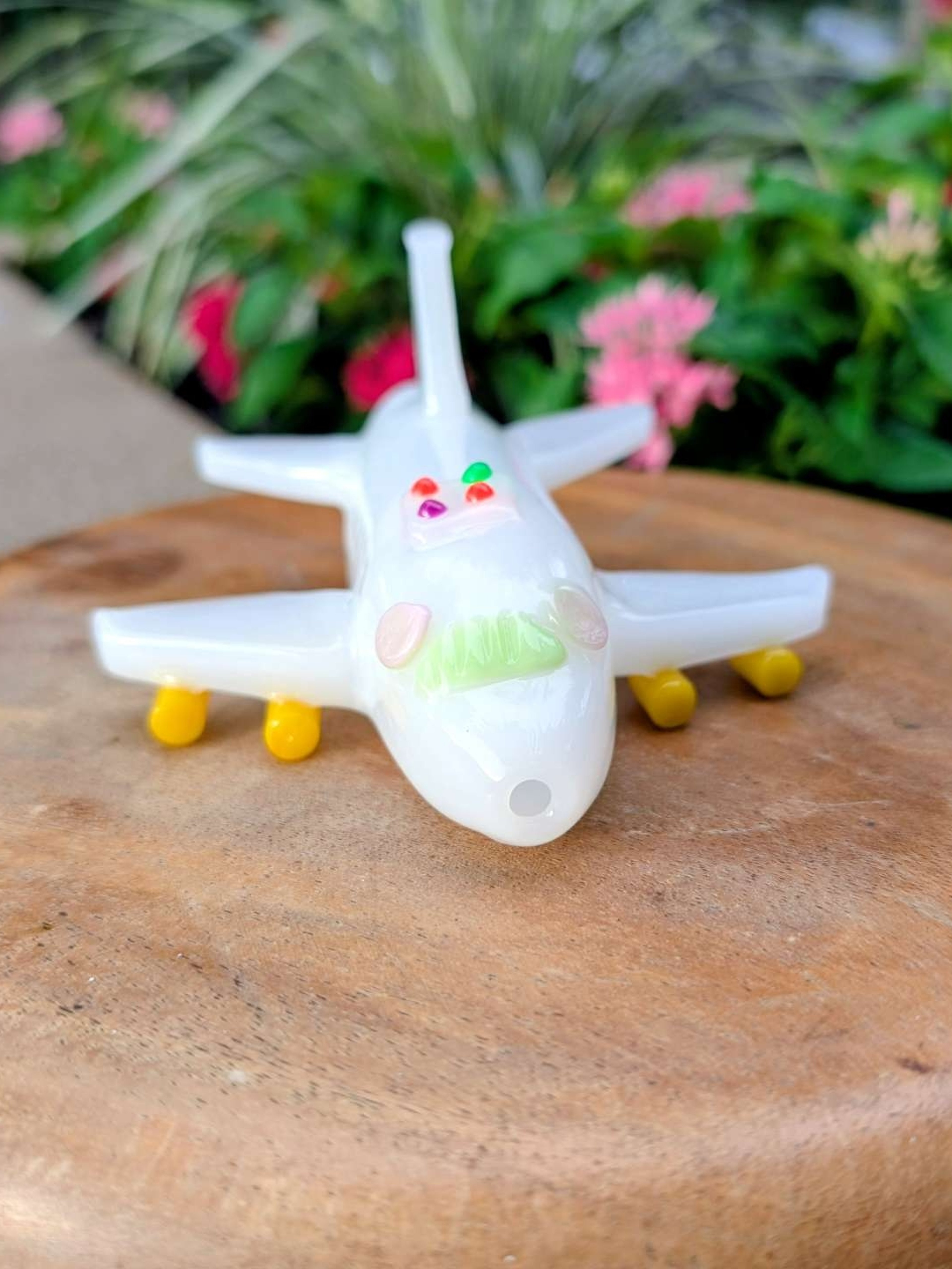 Preview pic of Empire Glassworks Pristine UV Airplane Spoon Pipe – White/Yellow/Pink Mustache