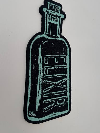 Preview pic of Kurt B Elixir Bottle Moodmat