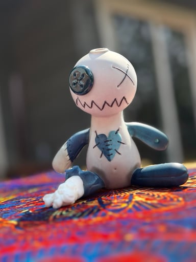 Preview pic of Muller glass, Voodoo doll