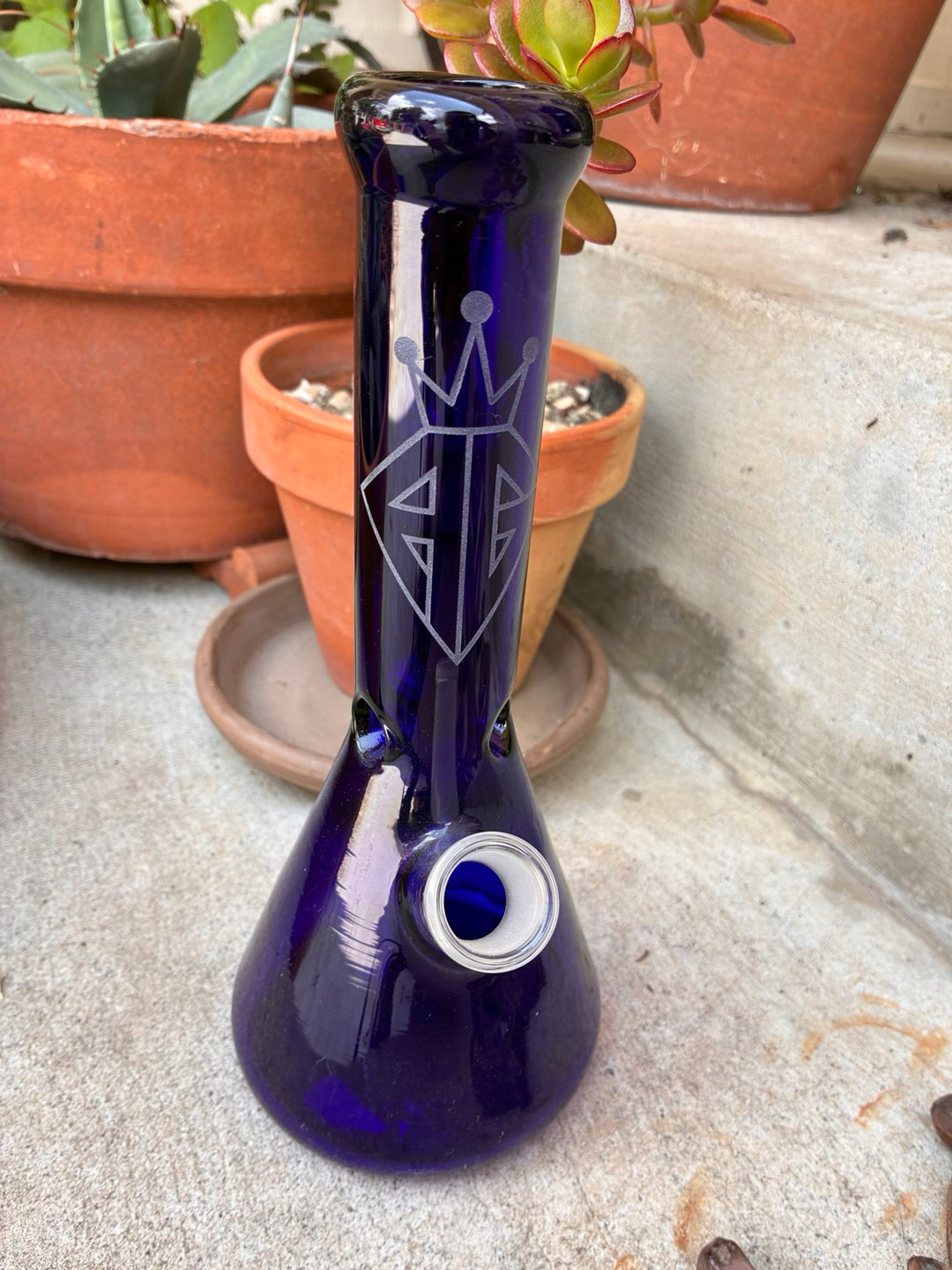 Preview pic of 10” dark blue beaker bottom bong by AMG