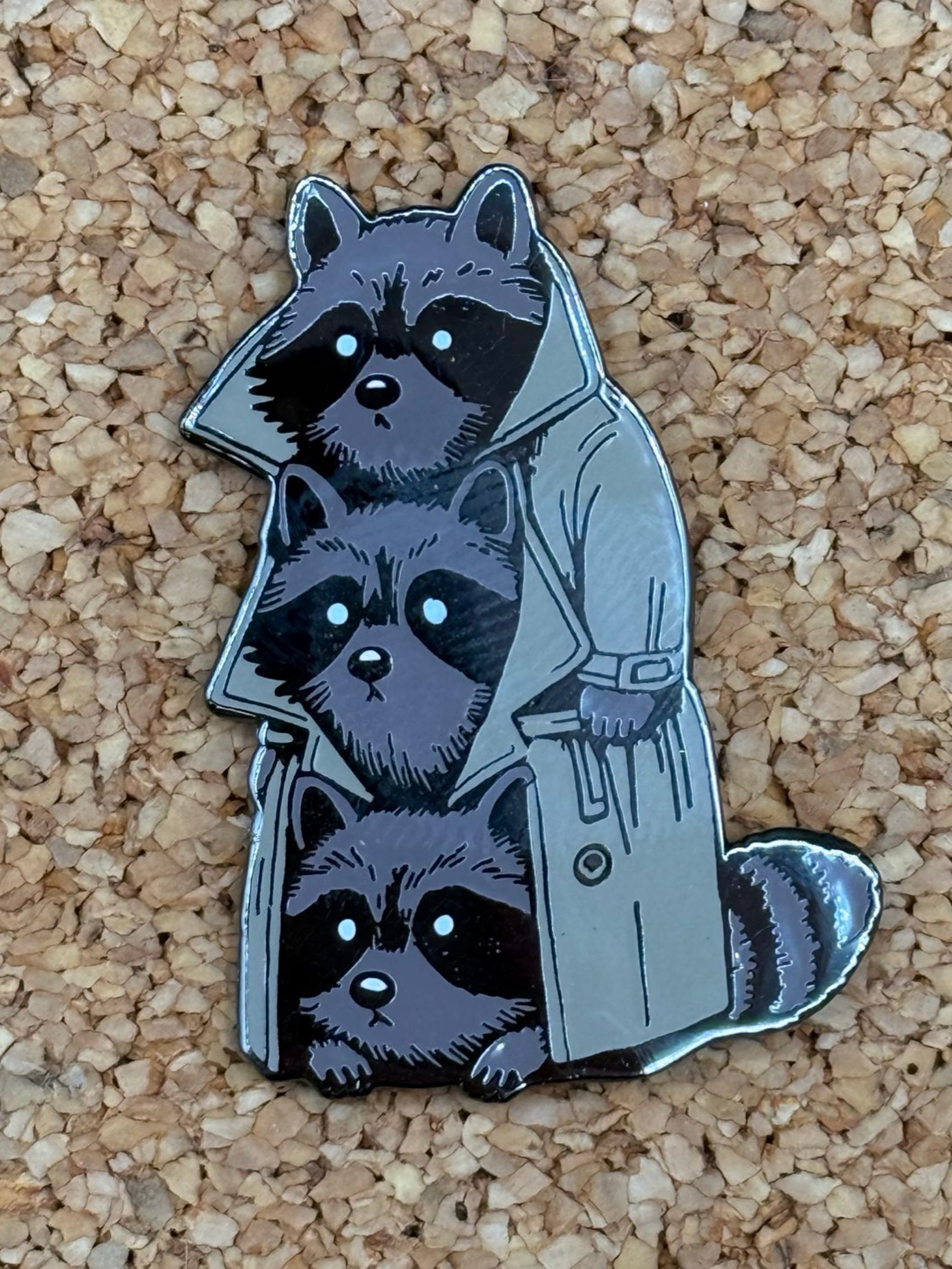 Preview pic of 3 raccoons in a trench coat pin