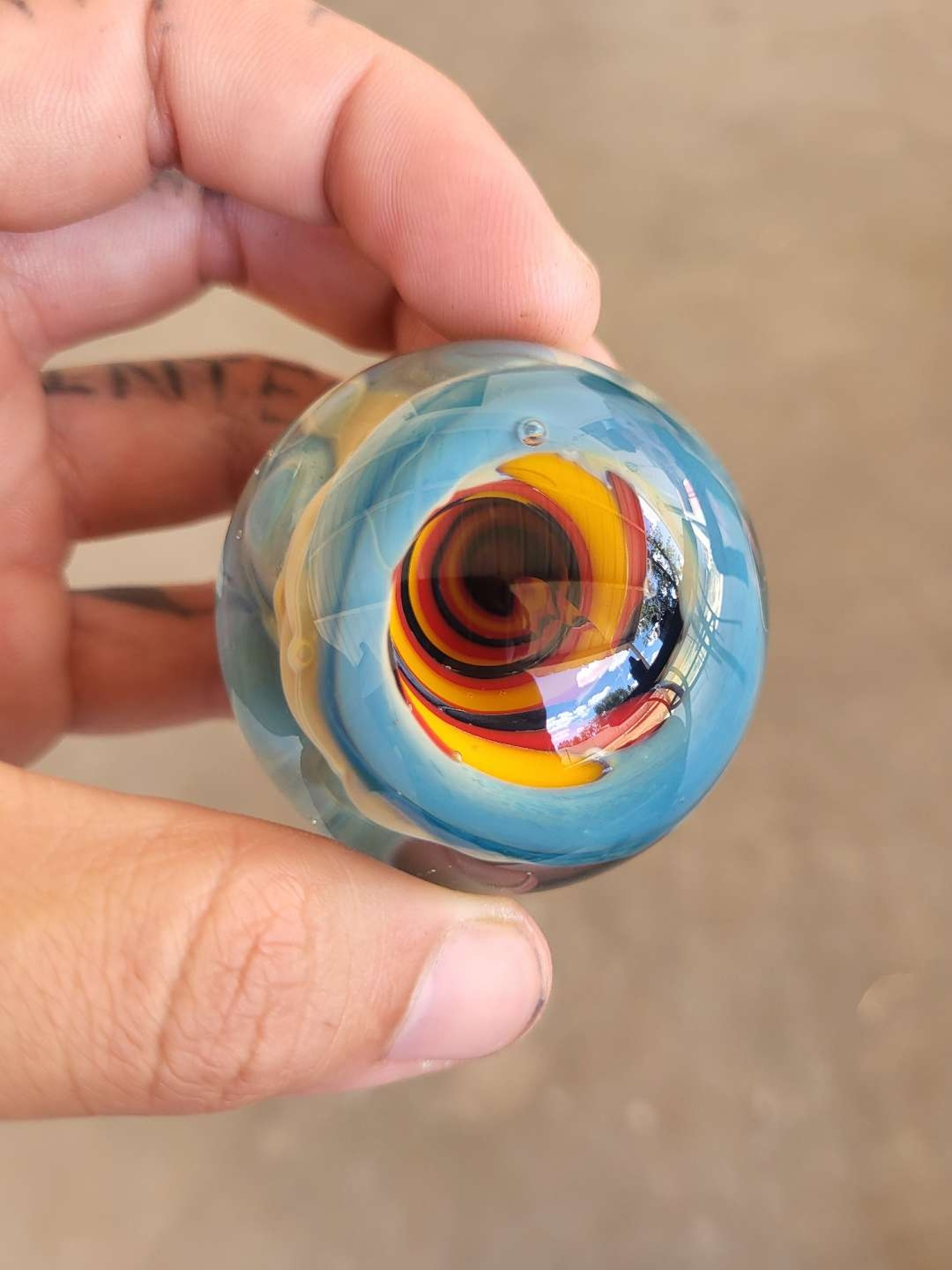 Red, Yellow, Black Vortex Marble image 0