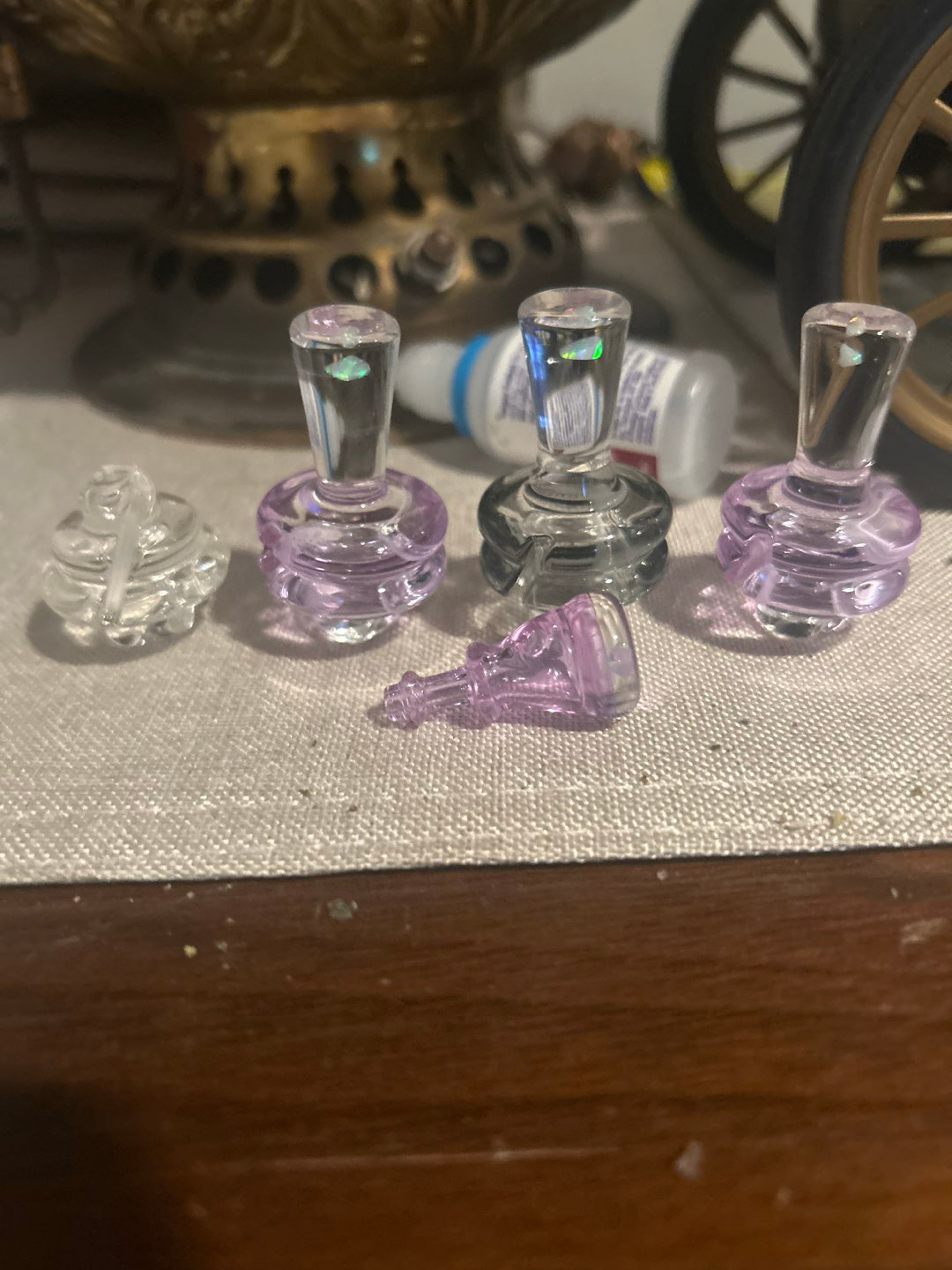 Set of 5 GG spinner caps never used image 0