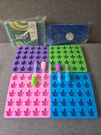 Preview pic of Candy and Butter mold kits w/ droppers and cleaning brush. New never used