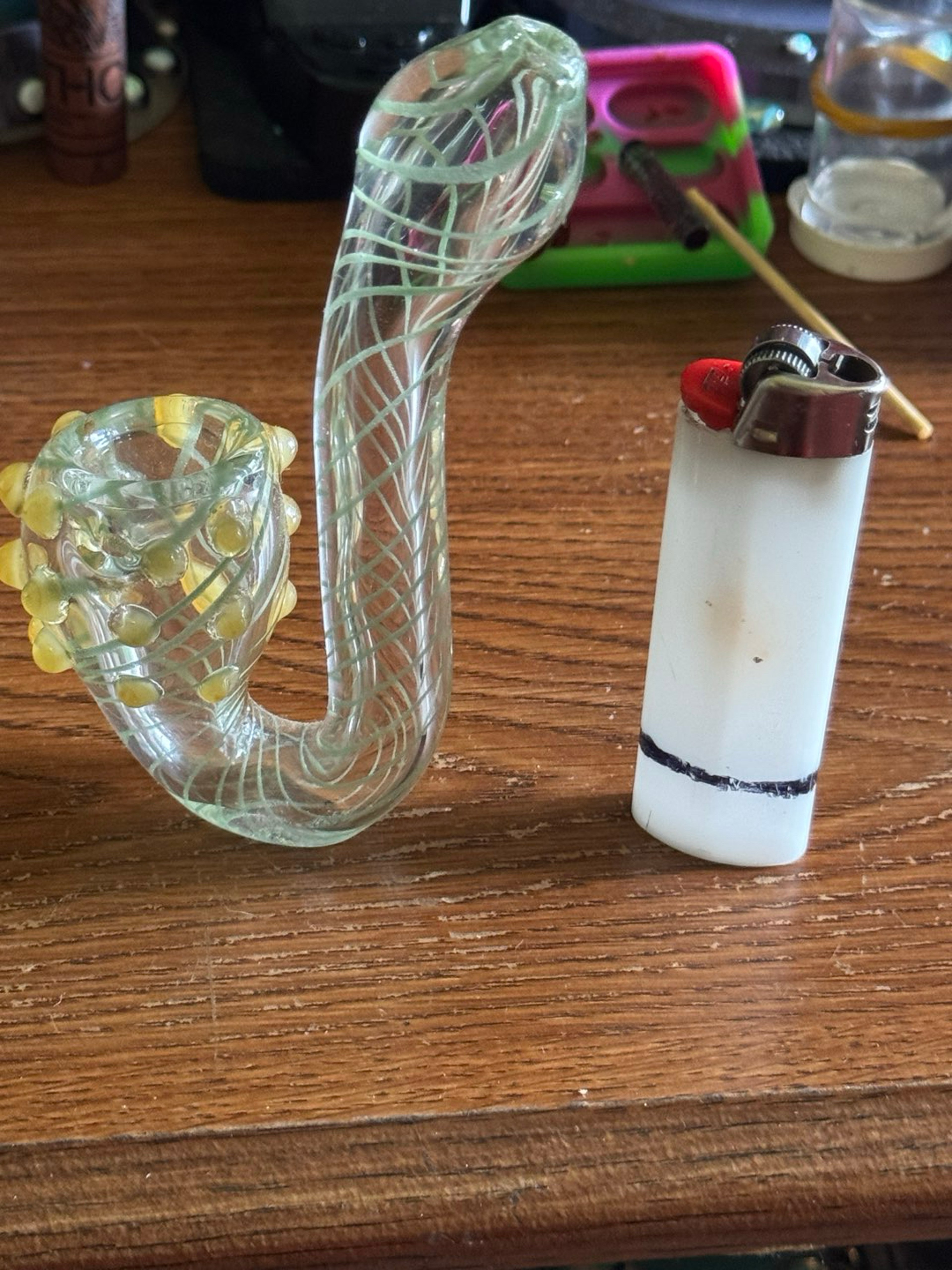 Preview pic of Clear Sherlock with light green latticino + yellow glass nubs on the bow