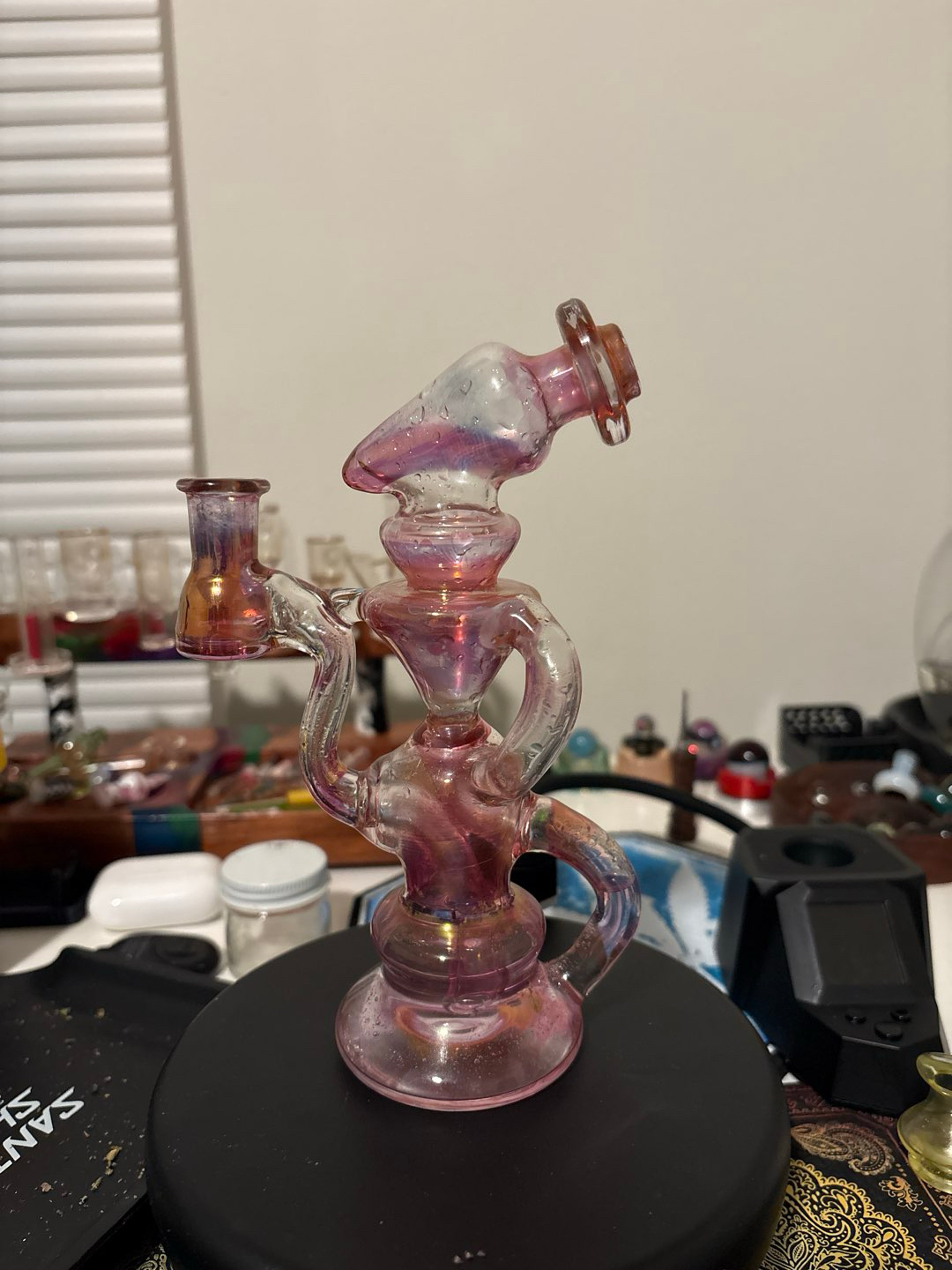 Preview pic of Trill Glass fumed recycler dab rig featuring a faceted Klein design.