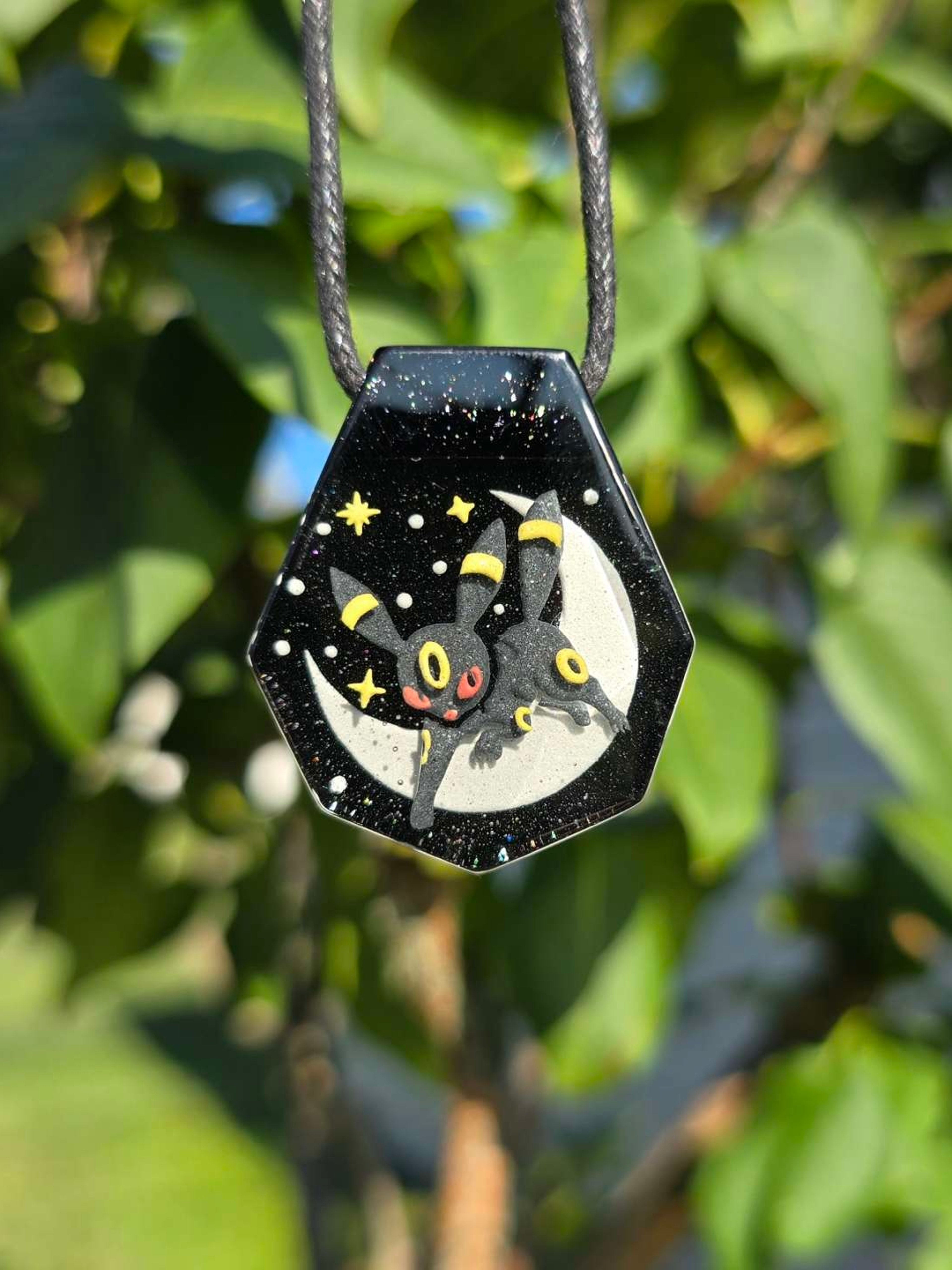 Preview pic of Umbreon Layered Glow UV Pendant