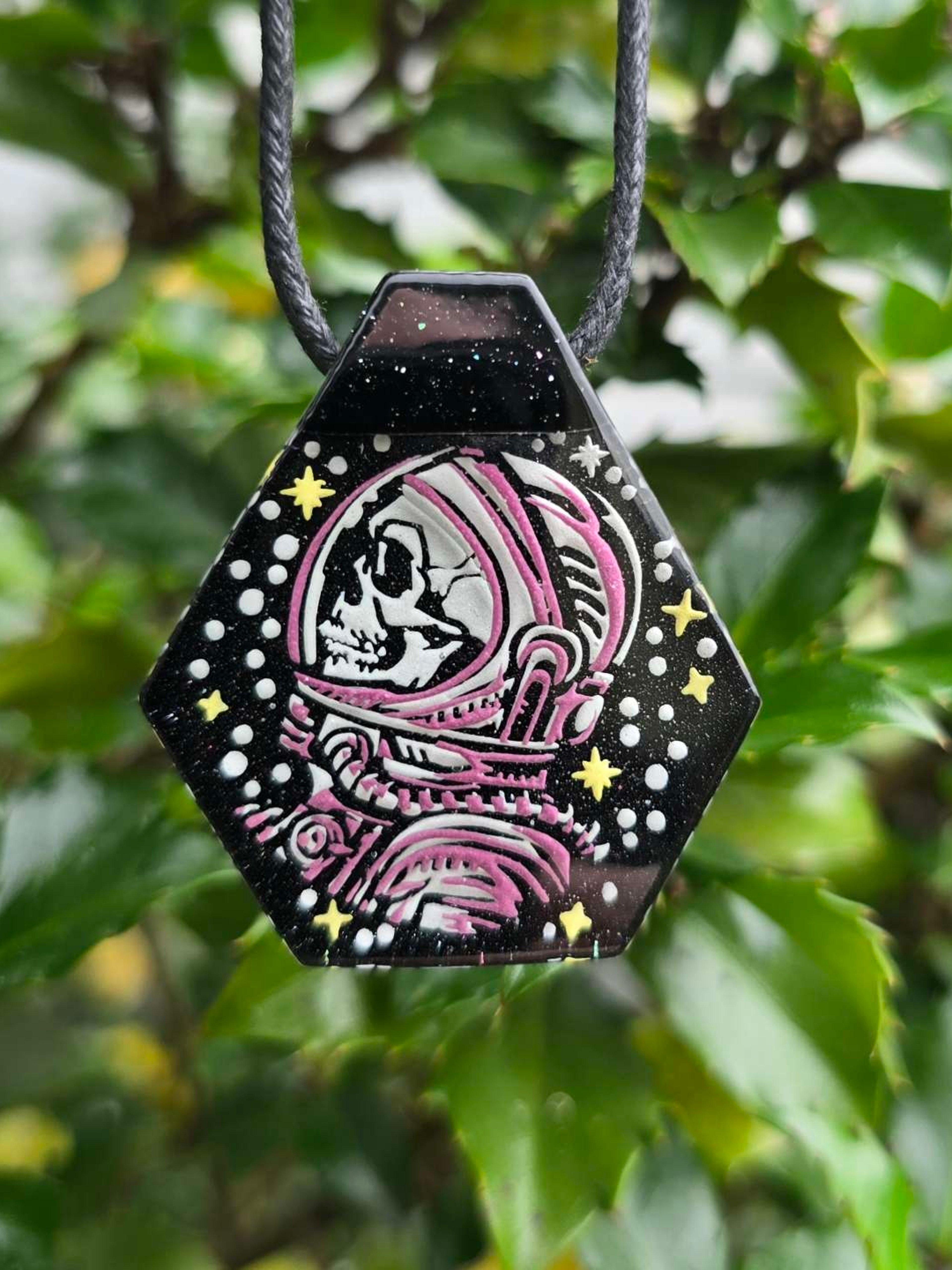 Preview pic of Astronaut Skull Layered Glow UV Pendant