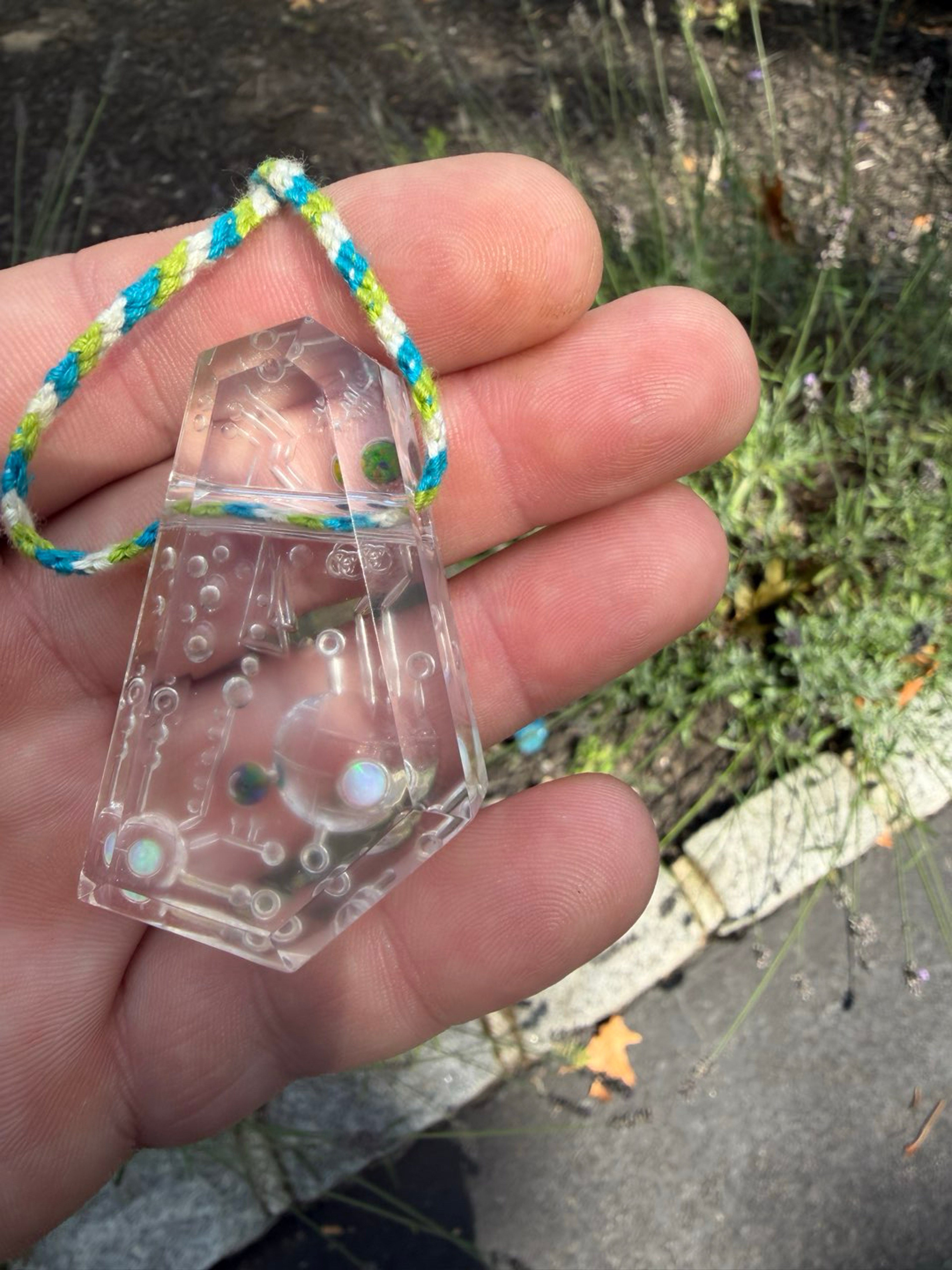 Murdoc Glass Decoder Pendant image 0