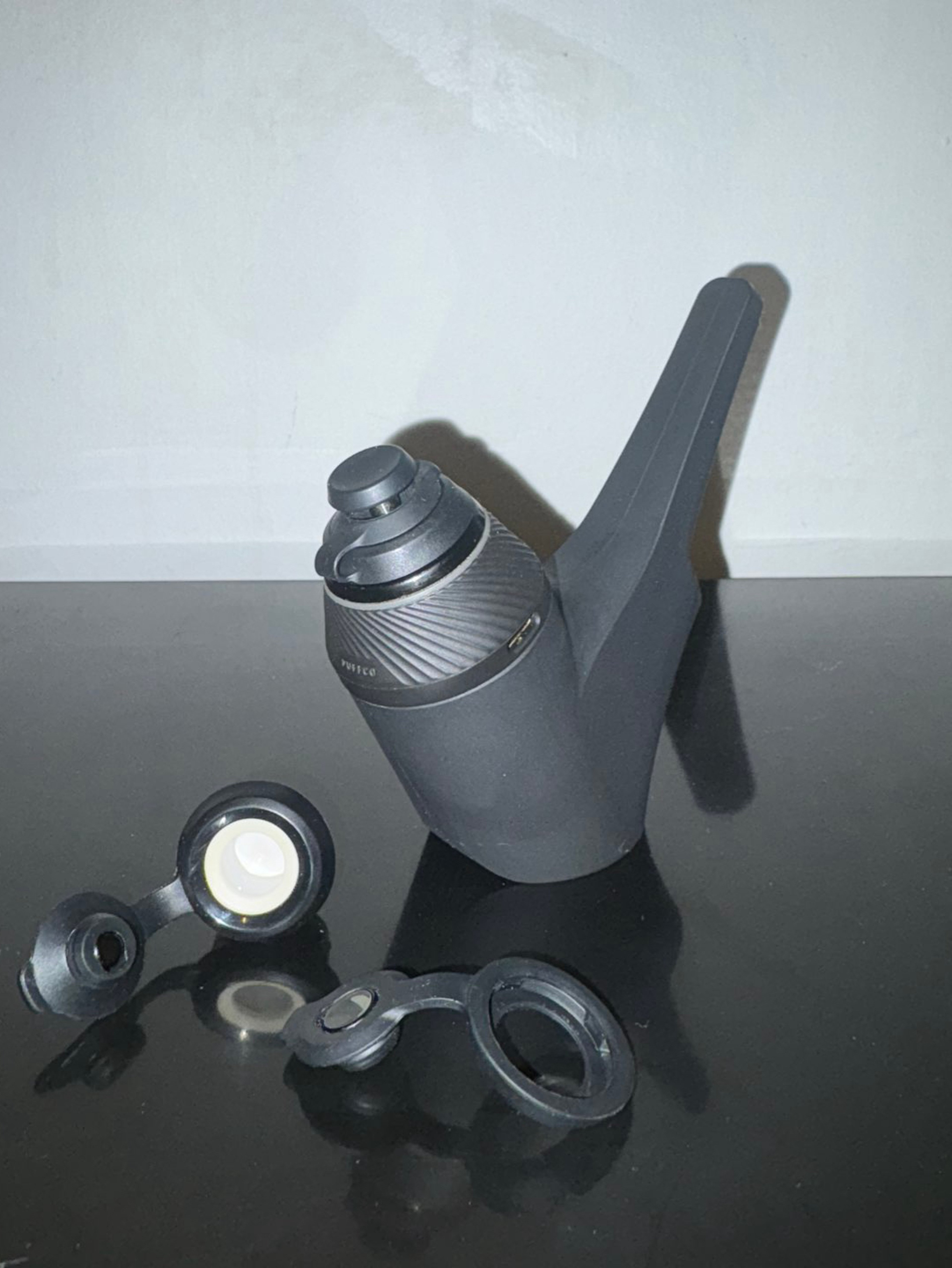 Preview pic of Puffco proxy v1 core with silicone travel pipe set up with extra coil and carb caps