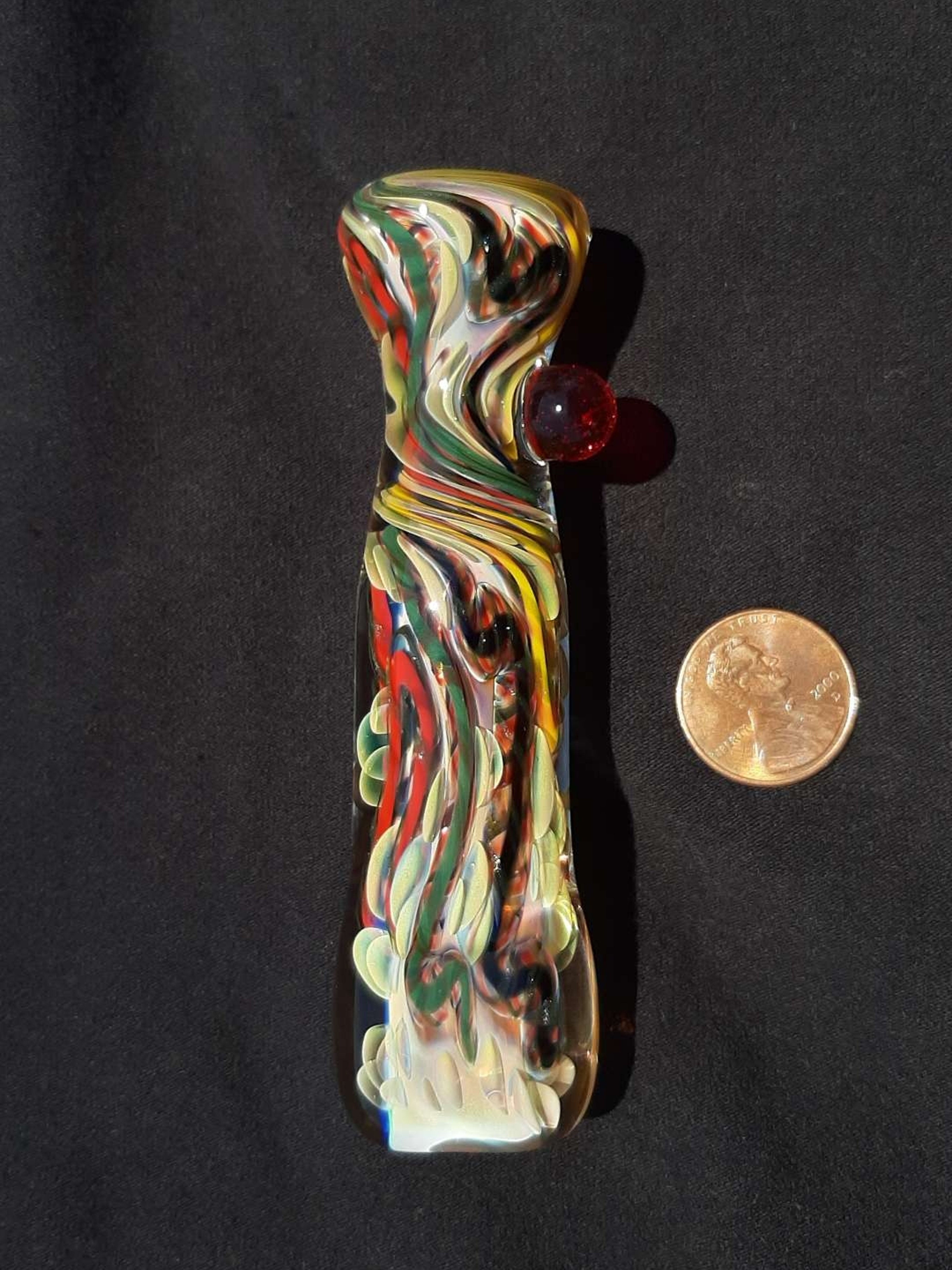 Preview pic of Inside out, color changing, borosilicate glass chillum with a flattened mouth. FREE SHIPPING