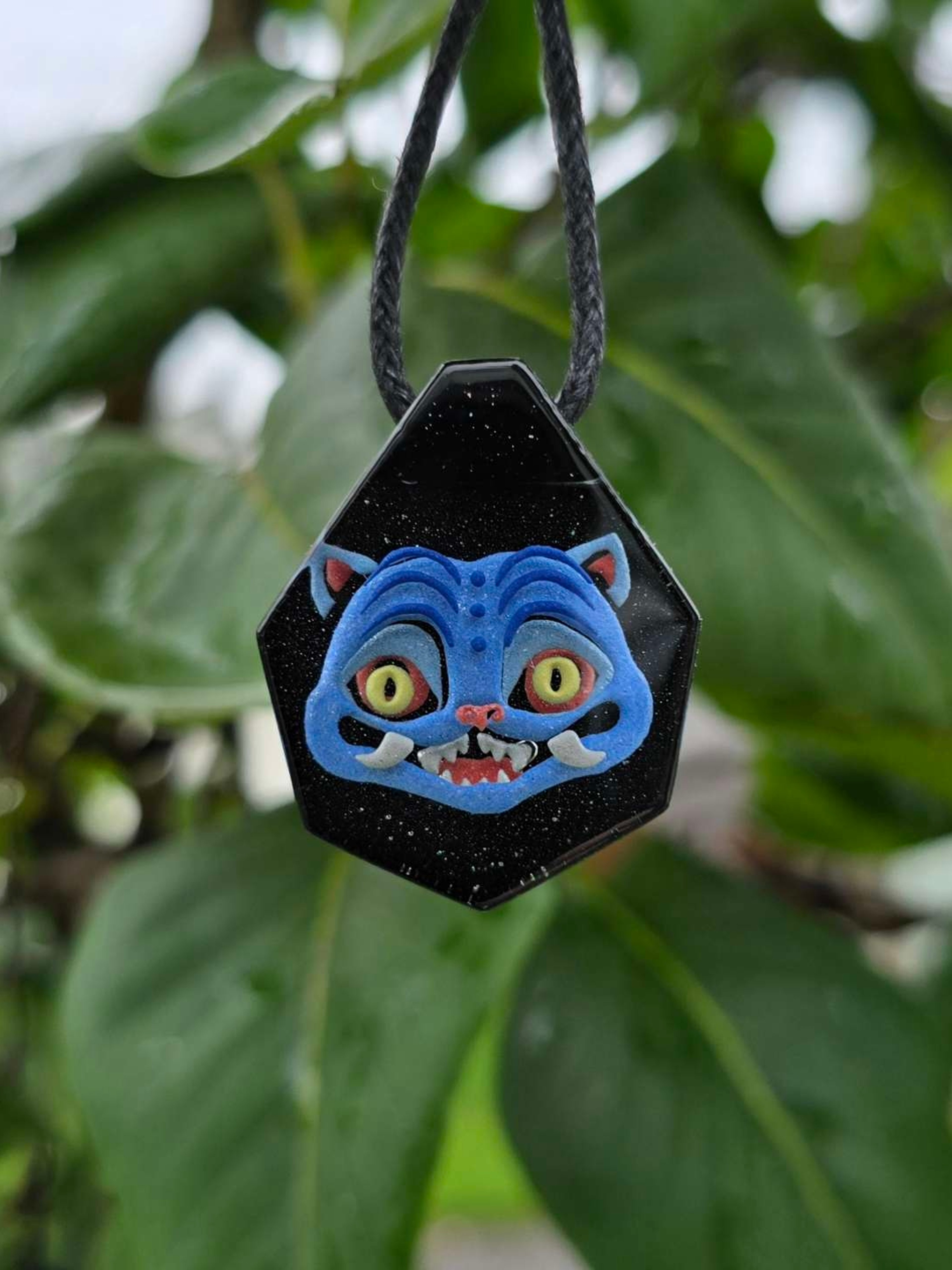 Preview pic of Derpy Tiger Demon Cat Layered Glow UV Pendant