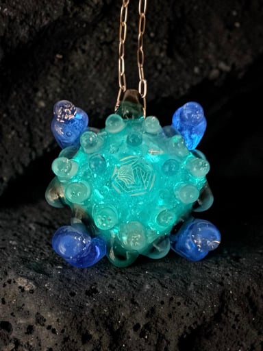 Preview pic of Glow in the Dark Sacred Geometry Borosilicate Glass Pendant – Handblown Dichroic Galaxy Glow Necklace, One of a Kind Sculptural Glass Art Jewelry