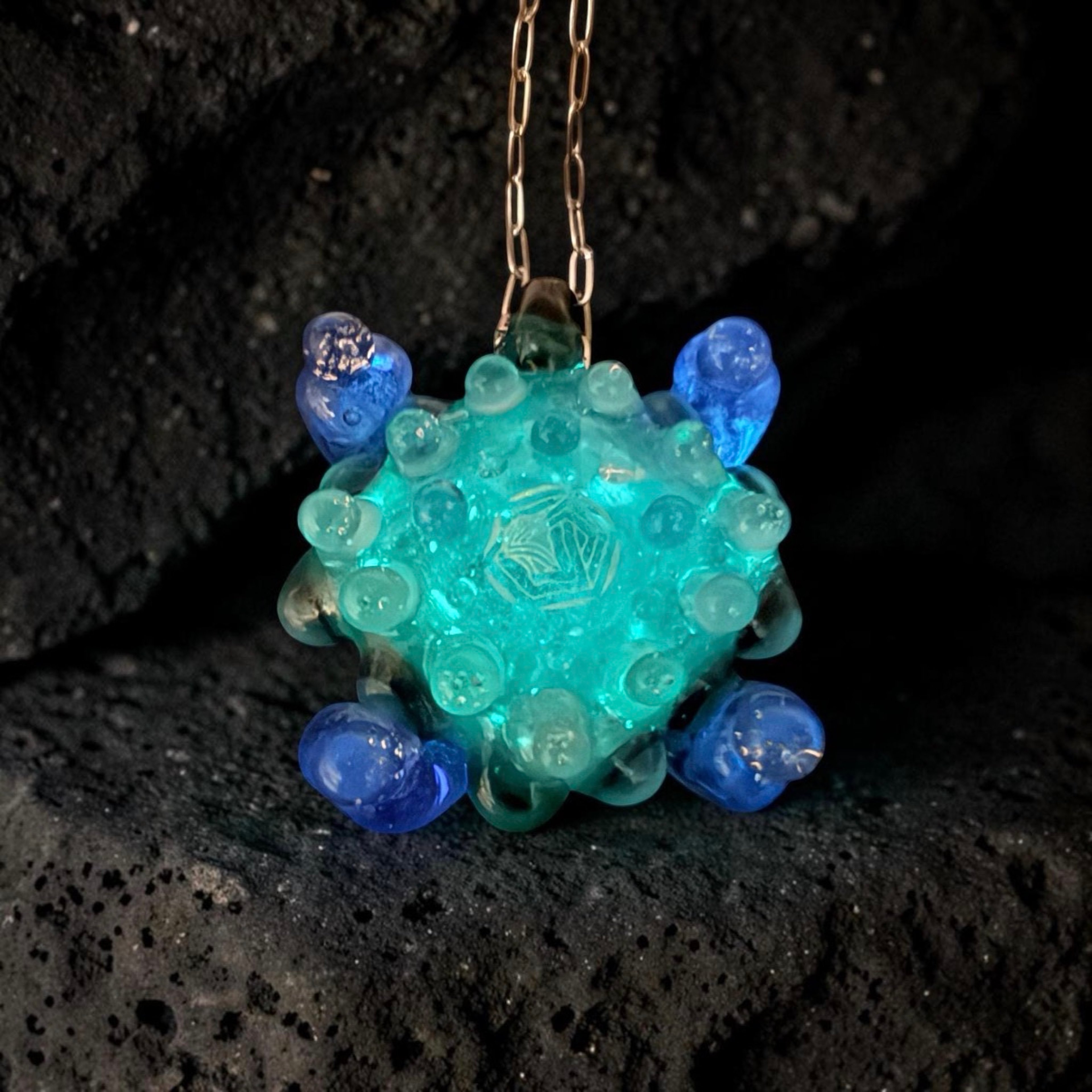 Preview pic of Glow in the Dark Sacred Geometry Borosilicate Glass Pendant – Handblown Dichroic Galaxy Glow Necklace, One of a Kind Sculptural Glass Art Jewelry