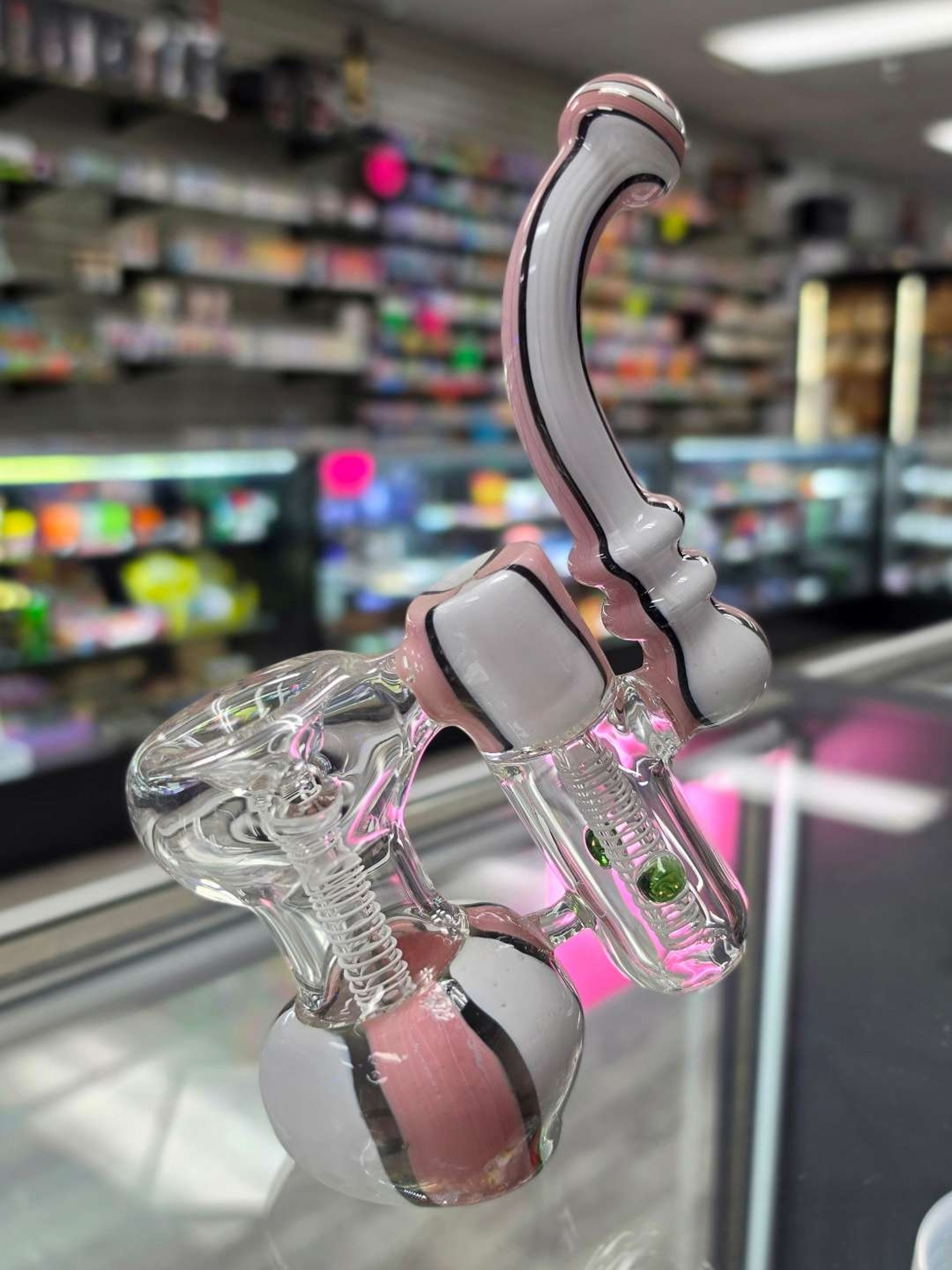 Preview pic of 7-inch double chamber glass bubbler features a pink and white striped colorway with dual inline percolators