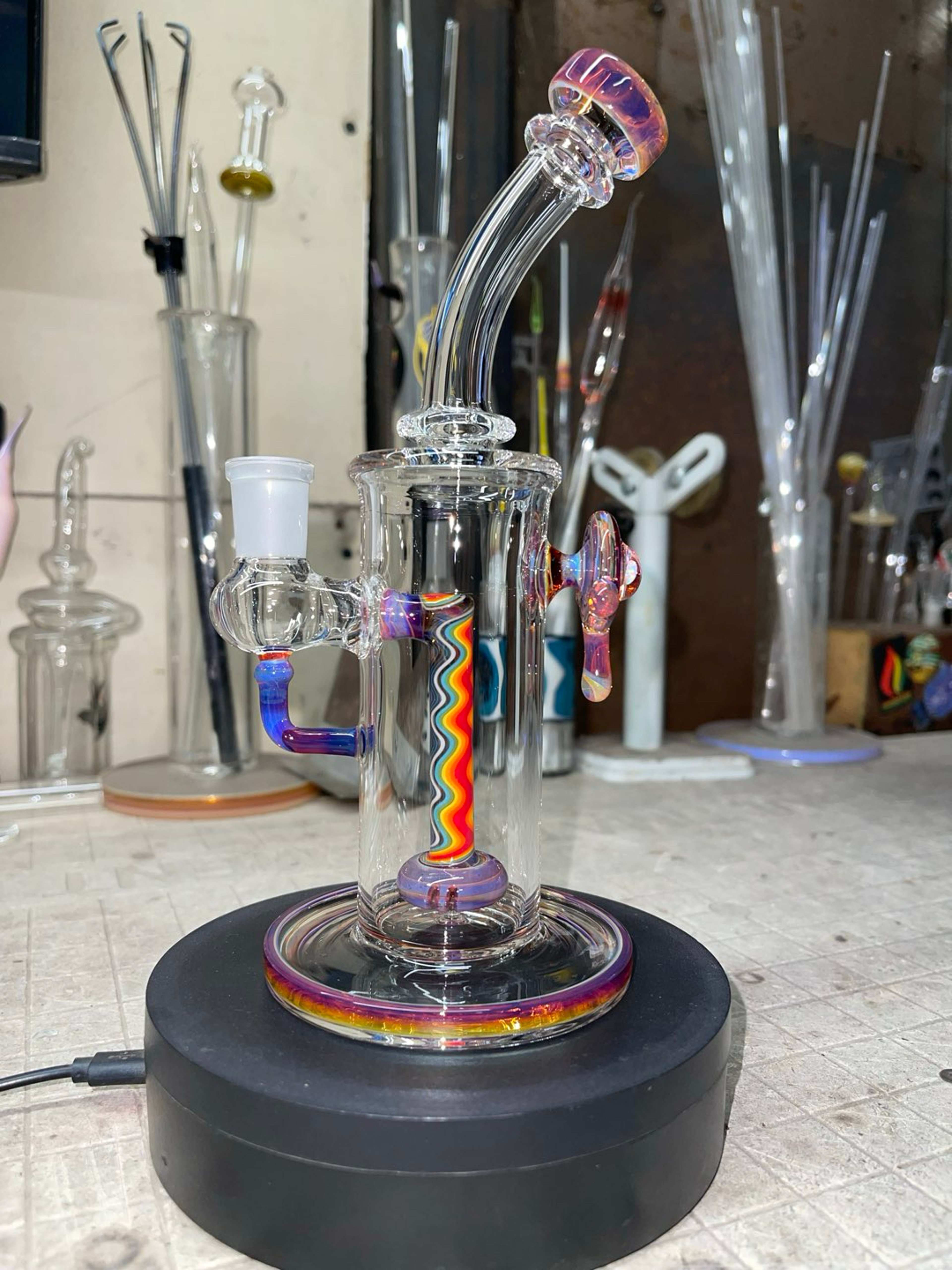 Preview pic of 8.75” tall, 14mm joint, amber purple color accents, 5 slits perc