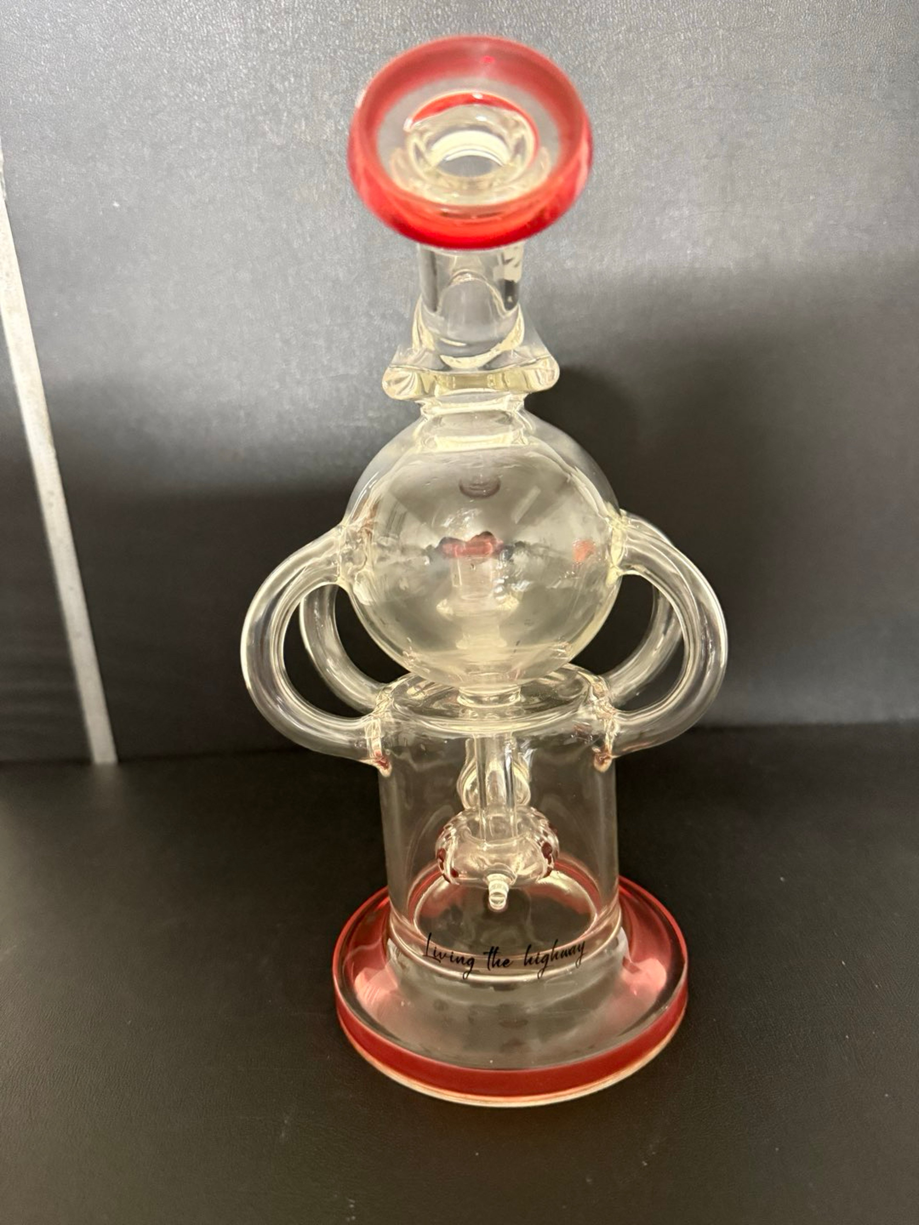 Preview pic of Beautiful 10 inch quad recycler by Highway Glass featuring 4 uptakes, a pointed splash guard and angled neck for comfort.