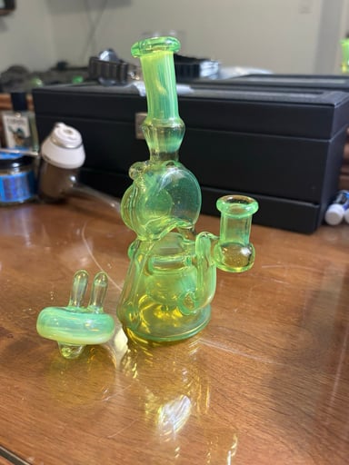 Preview pic of Glow in the Dark Recycler rig with custom carb cap by Pak Glass