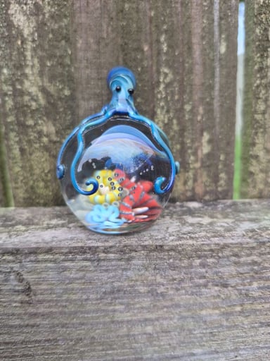 Preview pic of Octopus has the reef in his hands in this beautiful Borosilicate  flat bottom marble.