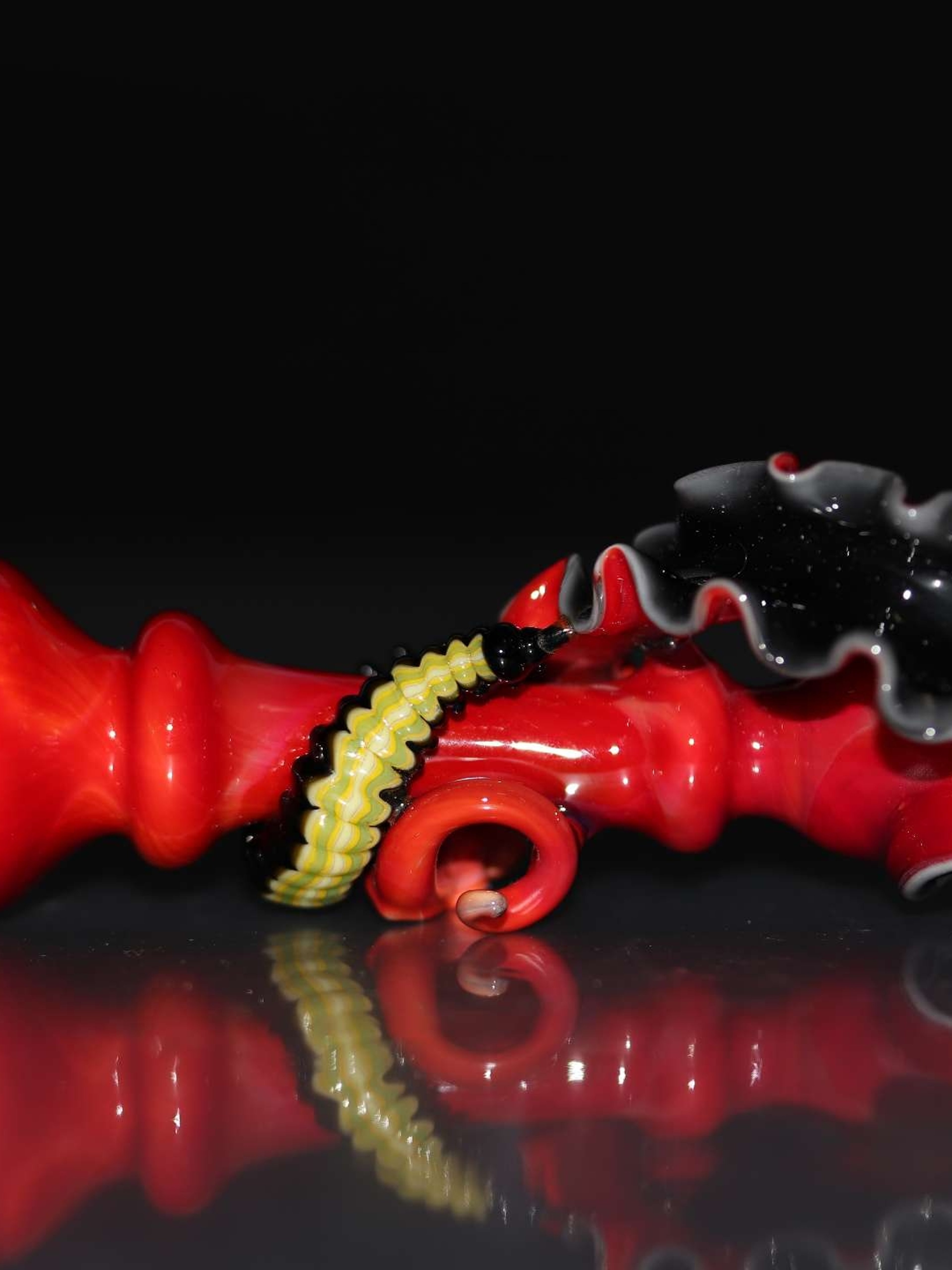 Preview pic of Micah Evans triple layer caterpillar chillum.