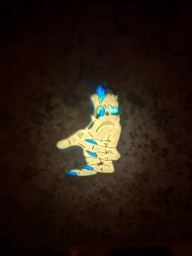 Preview pic of Zombie Hand Lighter Sleeve(Glow-In-The-Dark) – Orange Glow-Blue
