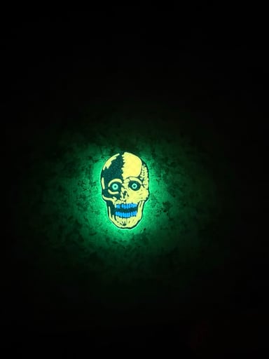 Preview pic of Two-Tone Split Skull Bic Lighter Sleeve – (Orange Glow)