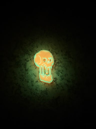 Preview pic of Melting Skull Bic Lighter Sleeve (Orange Glow)