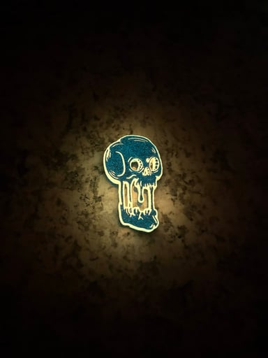 Preview pic of Melting Skull Bic Lighter Sleeve (Black Glow)