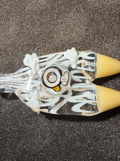 Preview pic of Calmbo x Elbo dinosaur tooth pendant