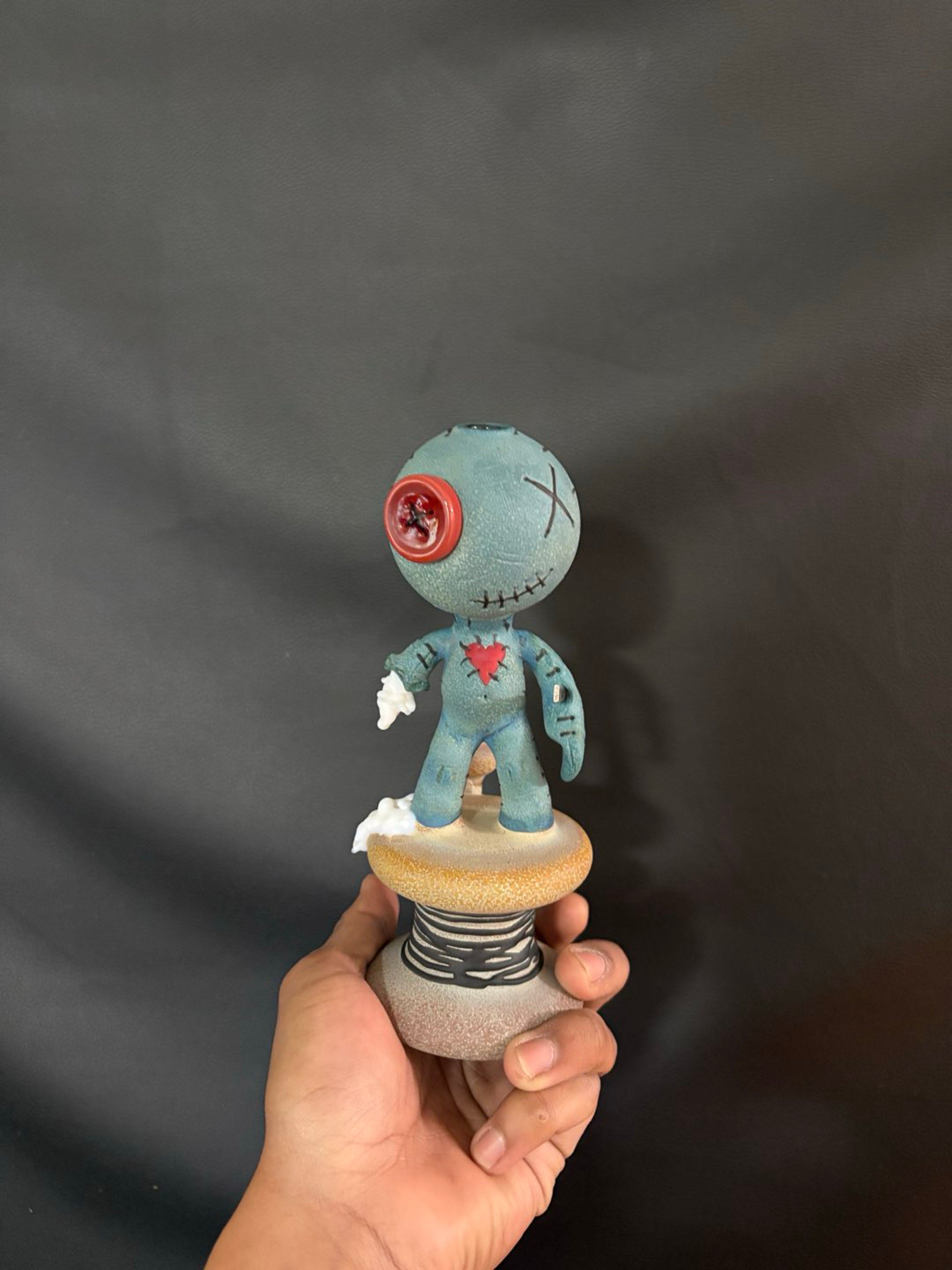 Muller doll on a spool image 0