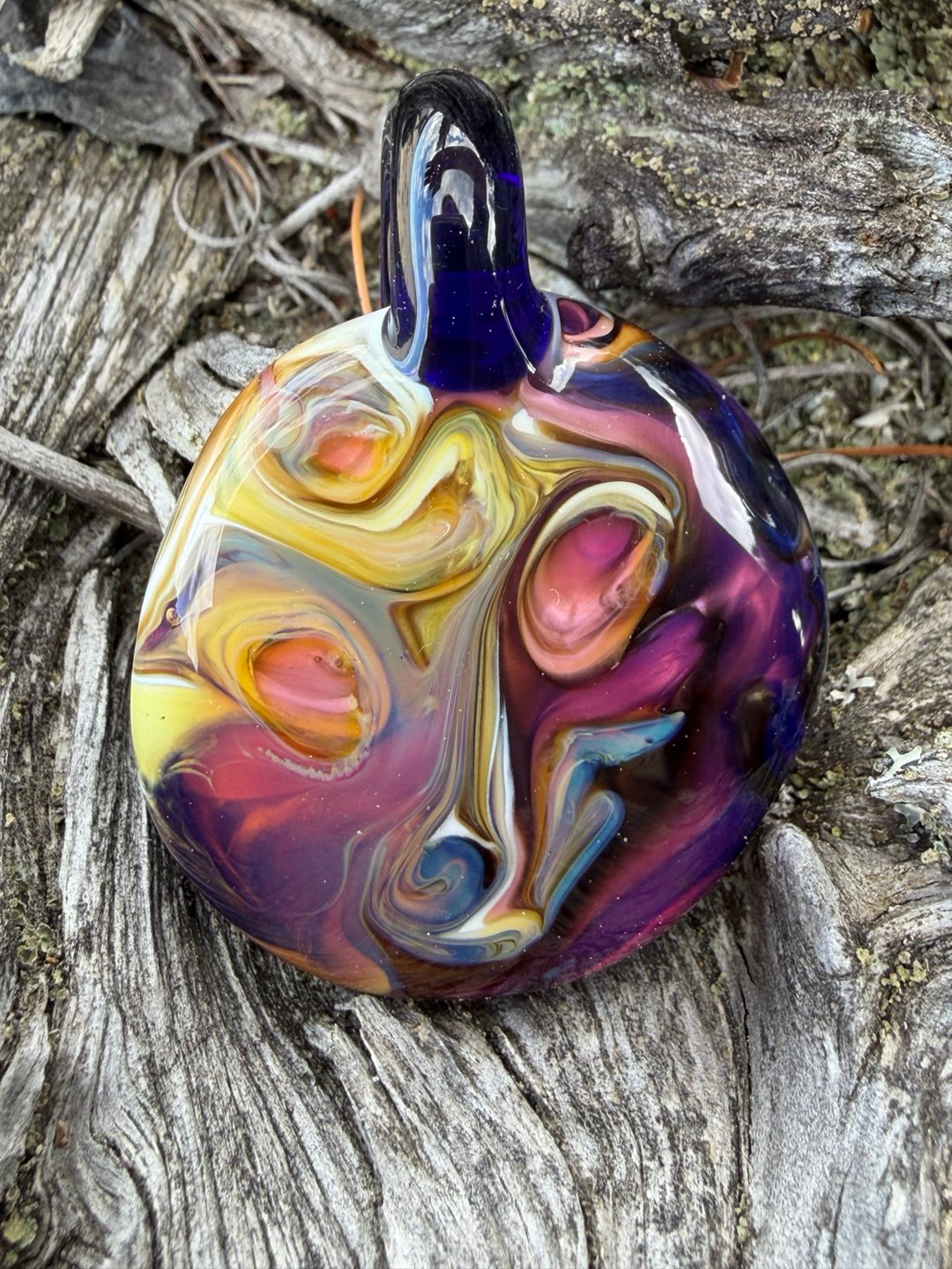 Preview pic of Double sided abstract face pendant