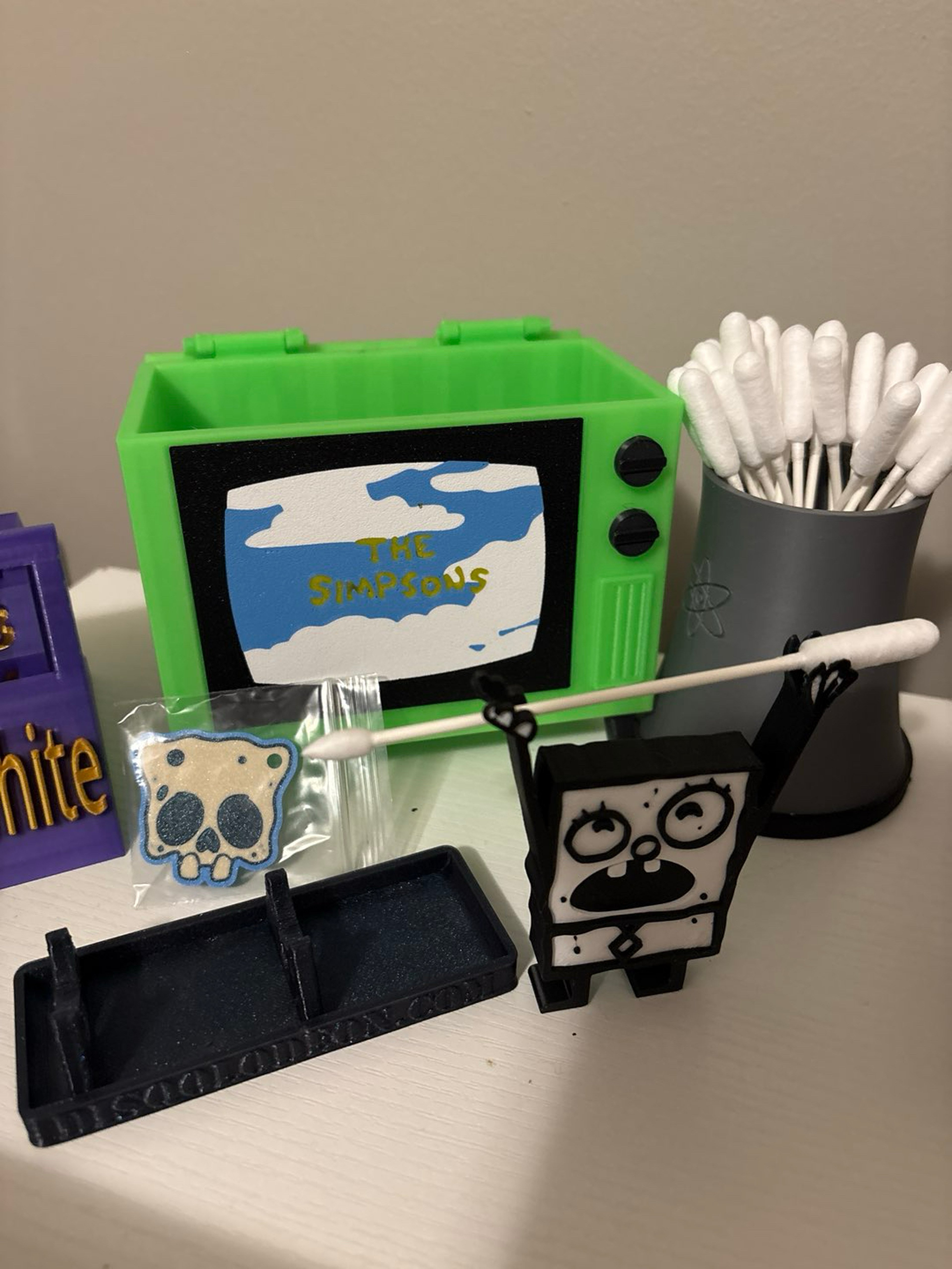 Preview pic of The Simpsons TV Q-tip holder and nuclear power plant tower, two hot knife or Q-tip holders plus a skull SpongeBob keychain accessory