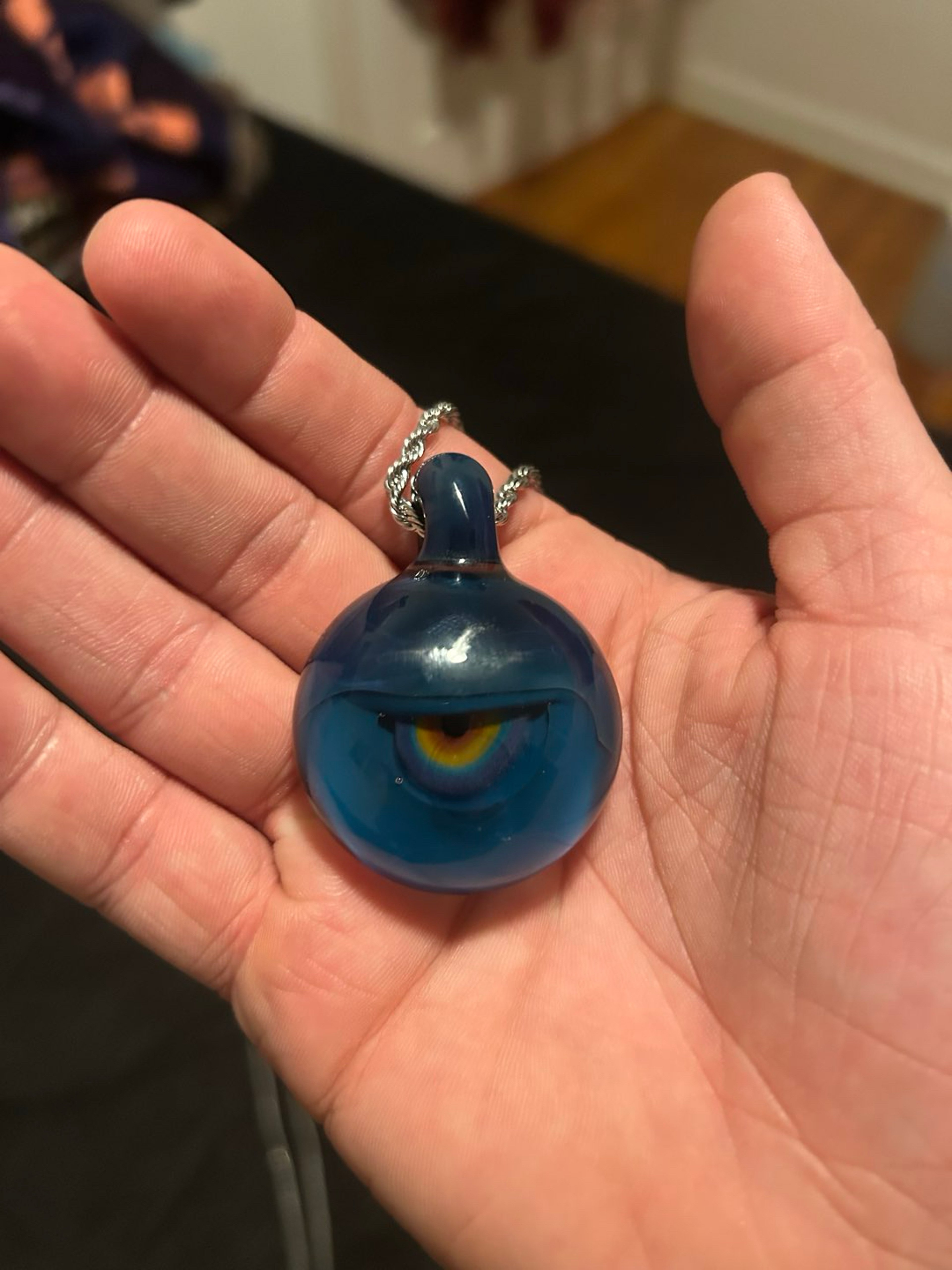 Preview pic of elbo dino eye pendant