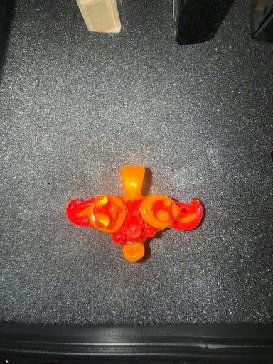 Preview pic of Orange and red Sunya glass trip sitter