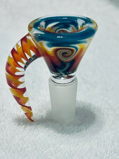 Preview pic of Colorful hand-blown glass bowl featuring teal, amber, red and white