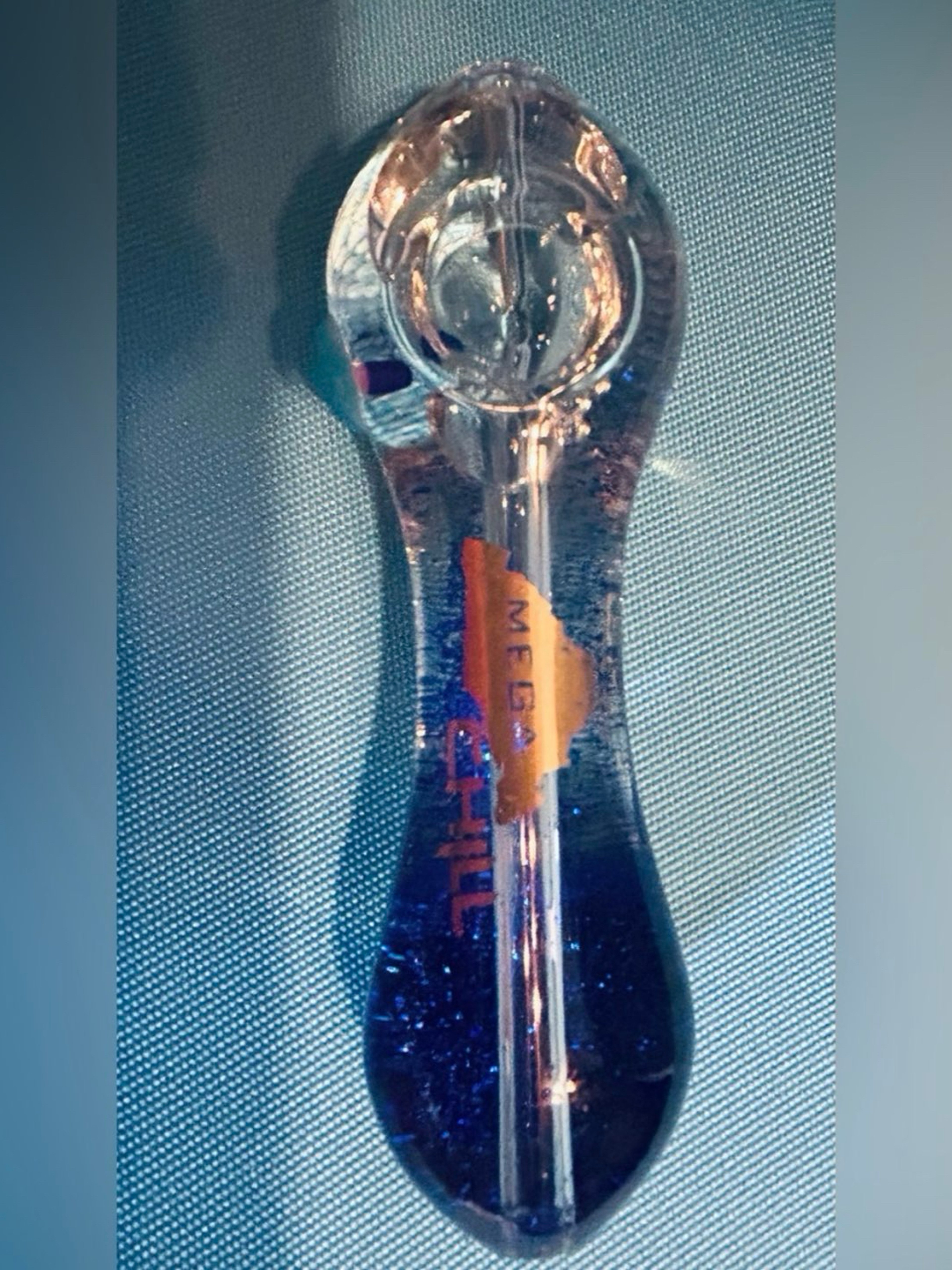 Preview pic of Authentic Mega Chill brand blue glitter glass hand pip